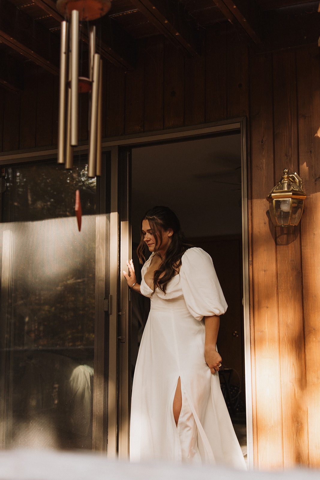 bride exits the AIRBNB ready for her echo lake elopement