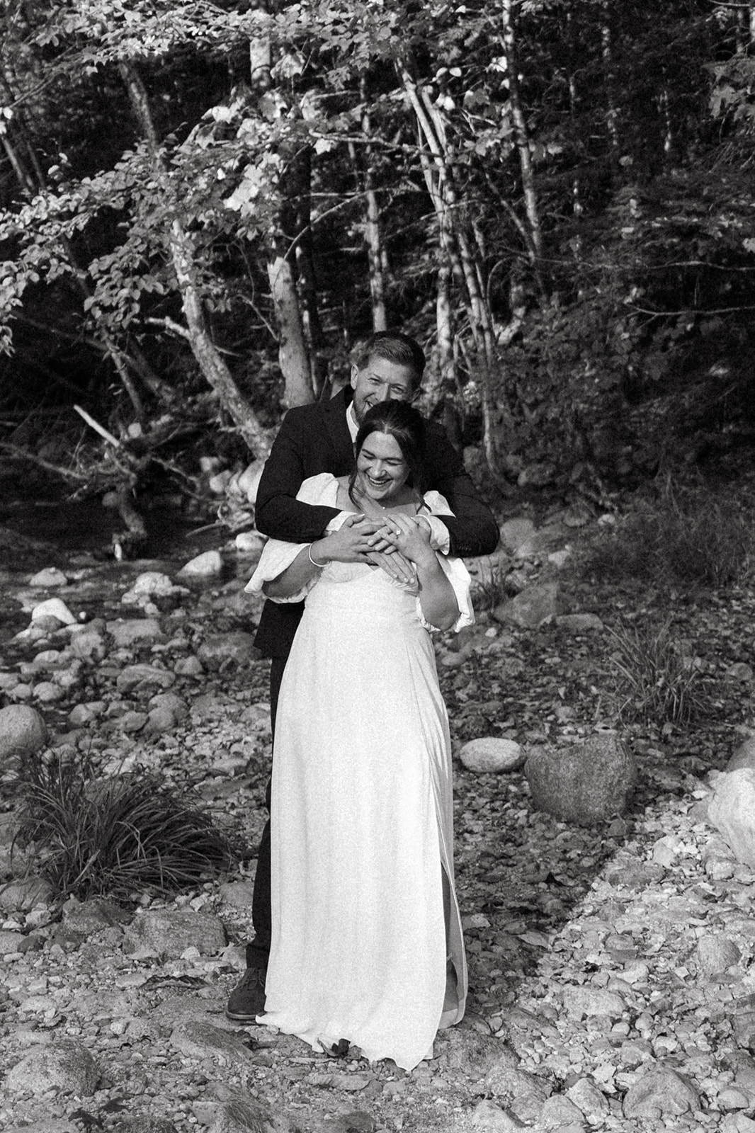 bride and groom share a hug after their intimate echo lake elopement