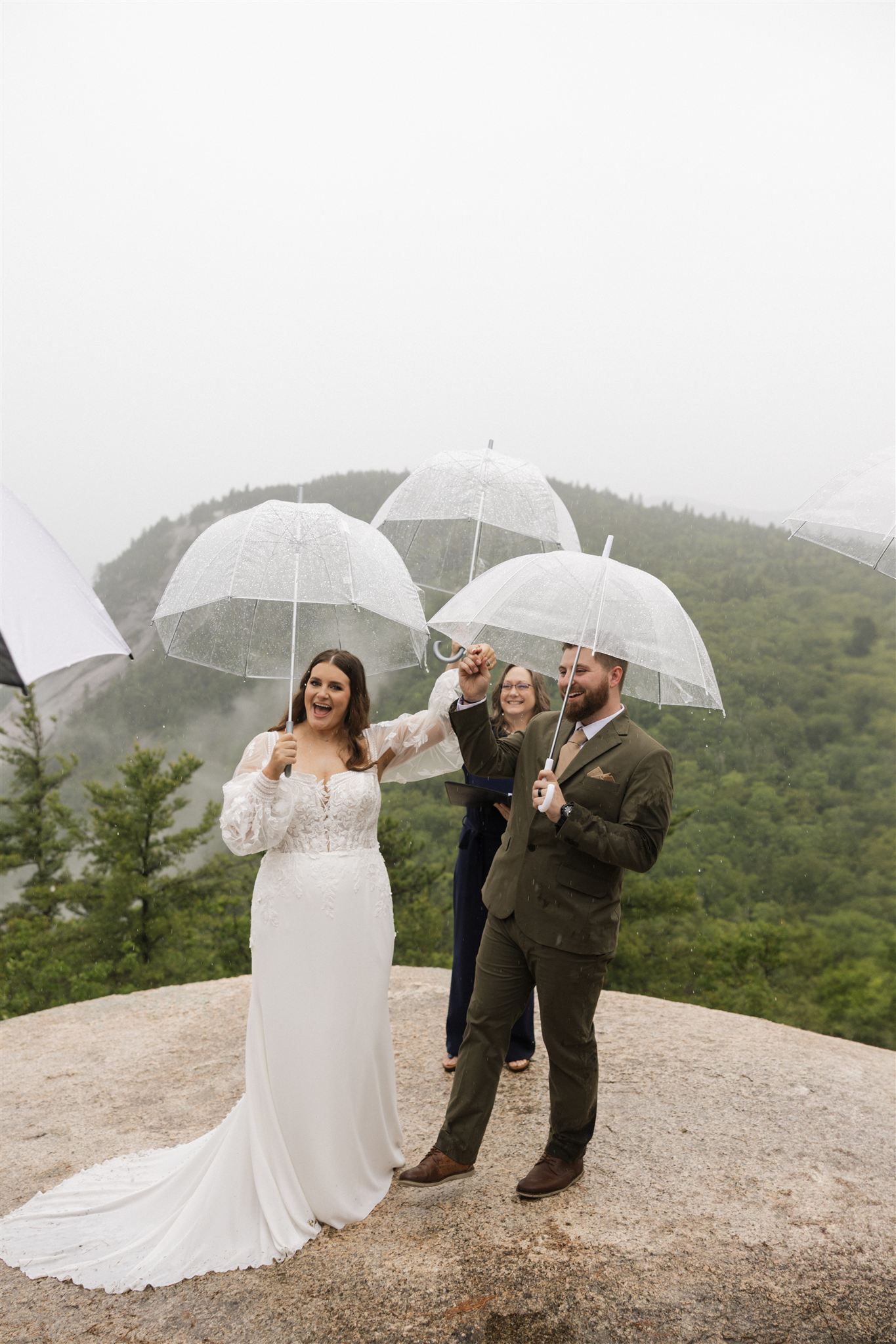 couple stand on cathedral ledge 