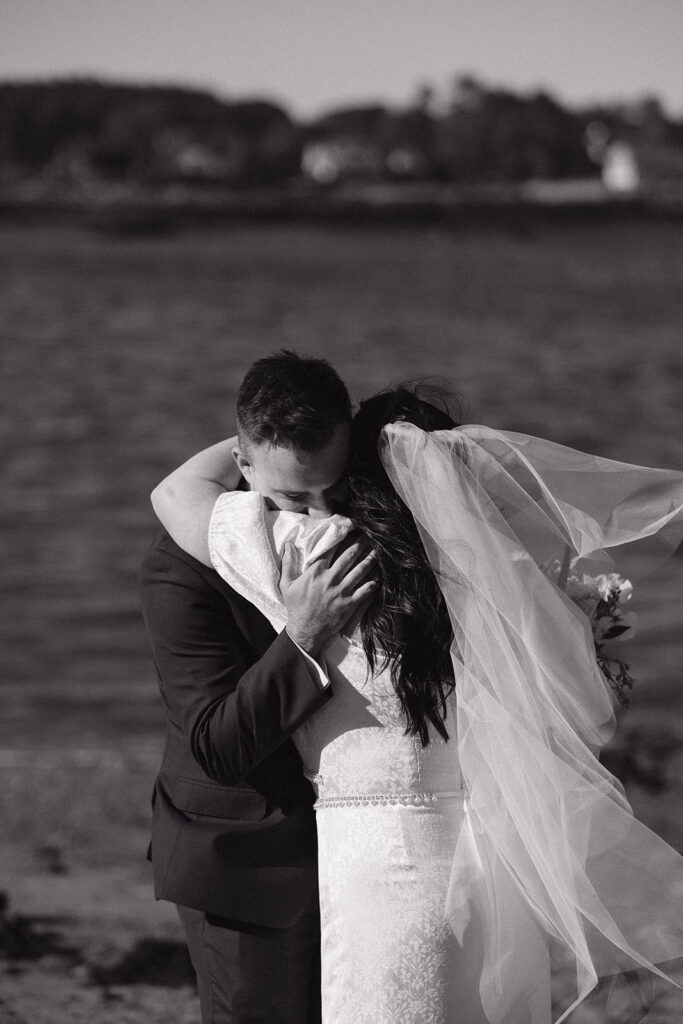 Couple saying vows at Rye Harbor State Park in New Hampshire