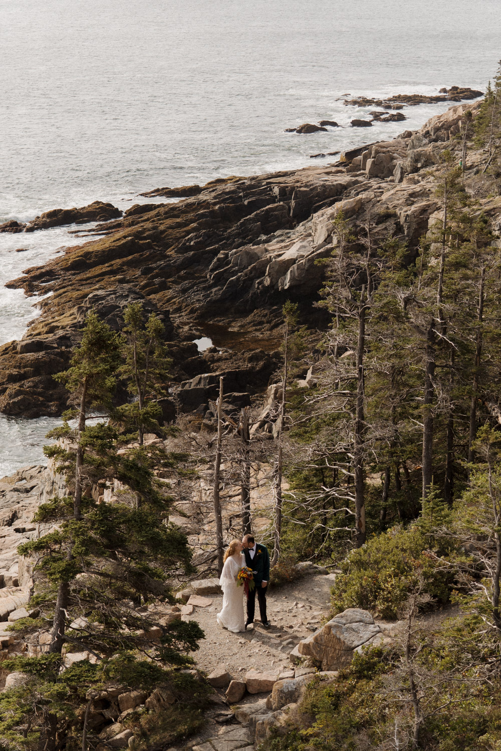 bride and groom are perfect example of how to elope at Acadia national park, Otter Cliffs  