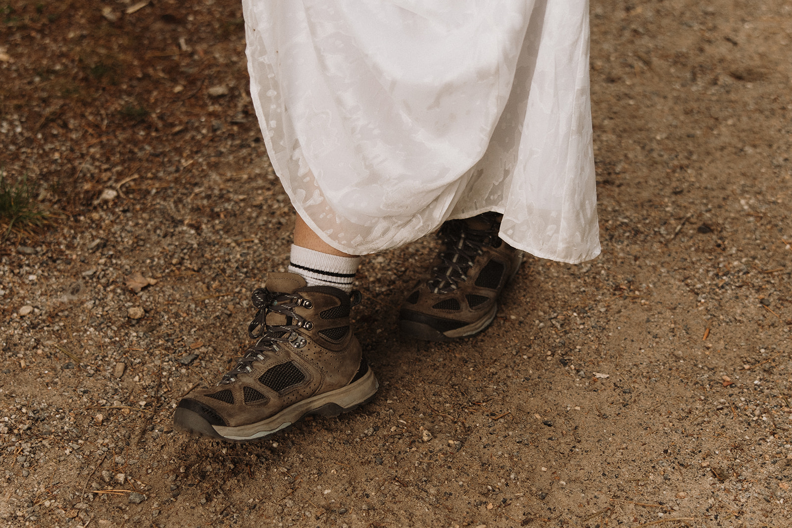 brides hiking boots on her stunning NH elopement day