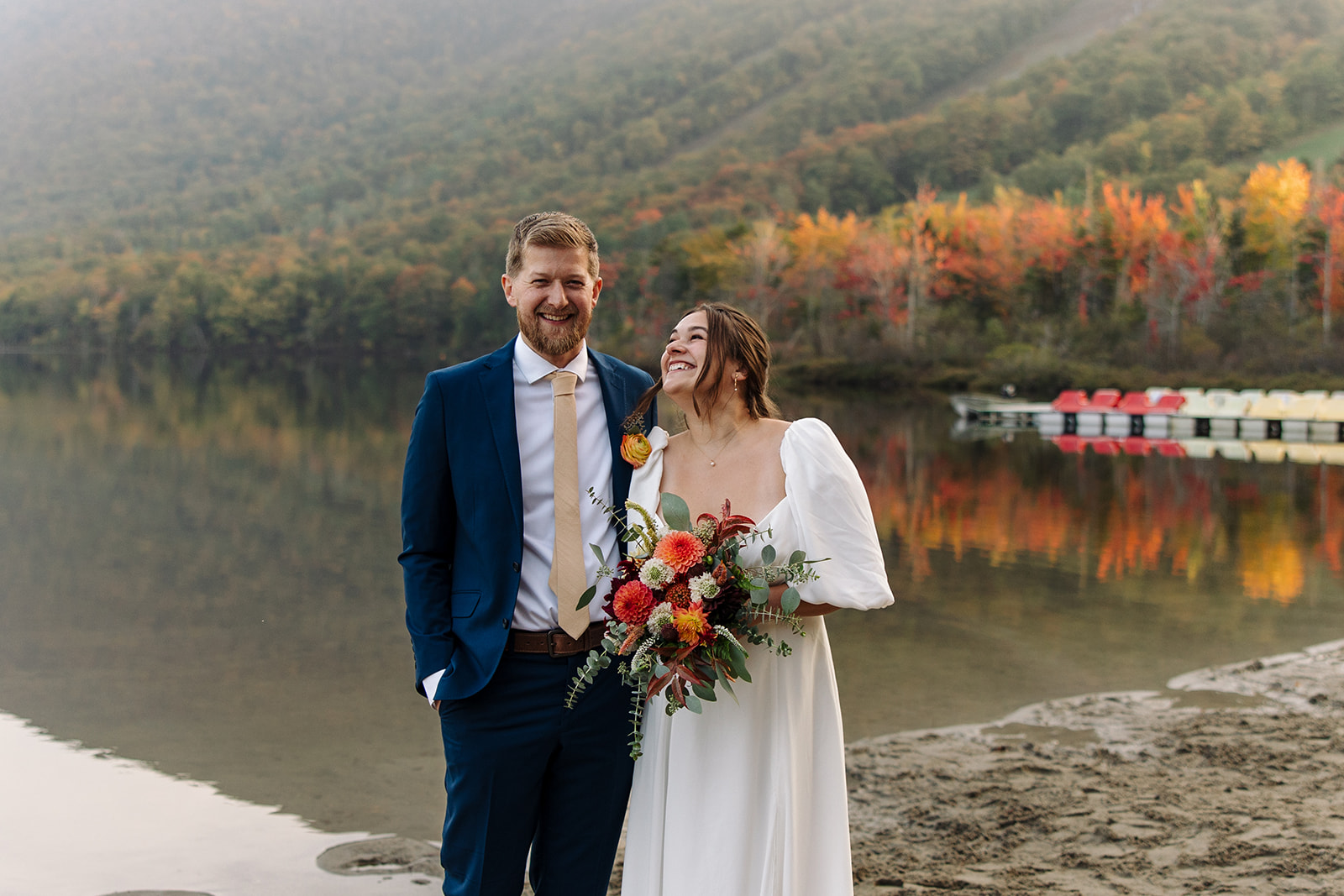 beautiful elopement ceremony takes place beside a New Hampshire lake