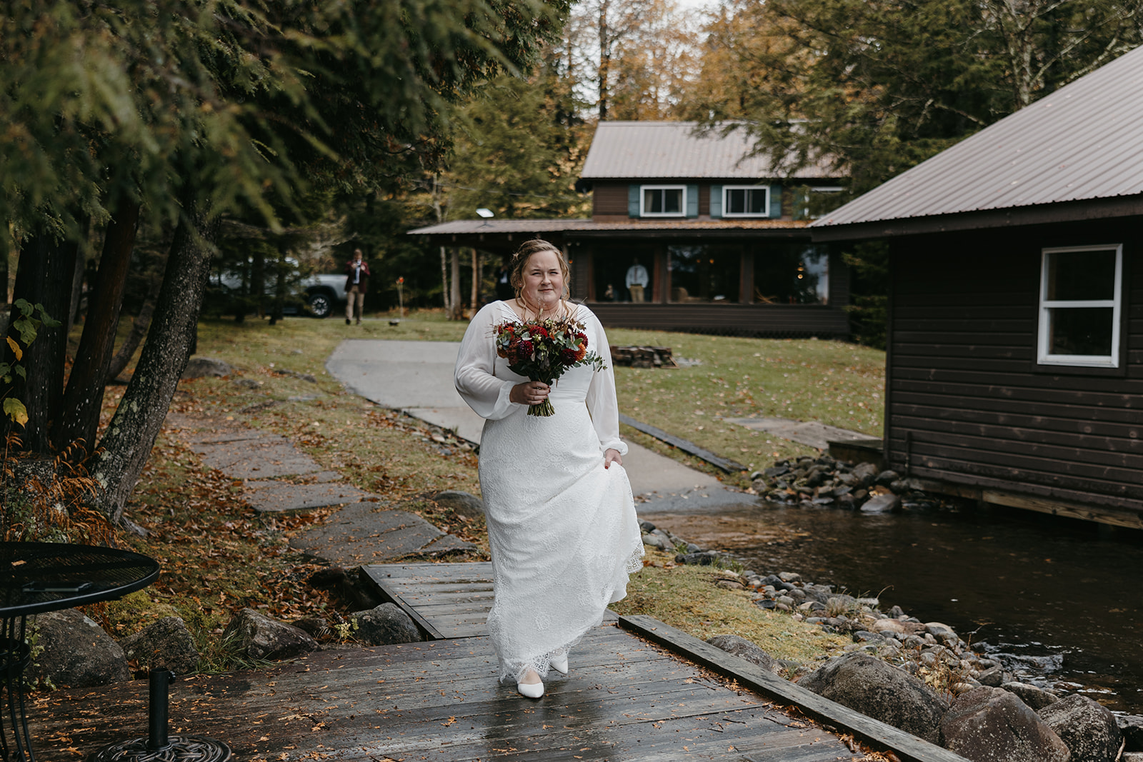 bride walks towards the docks for their emotional first look photoshoot