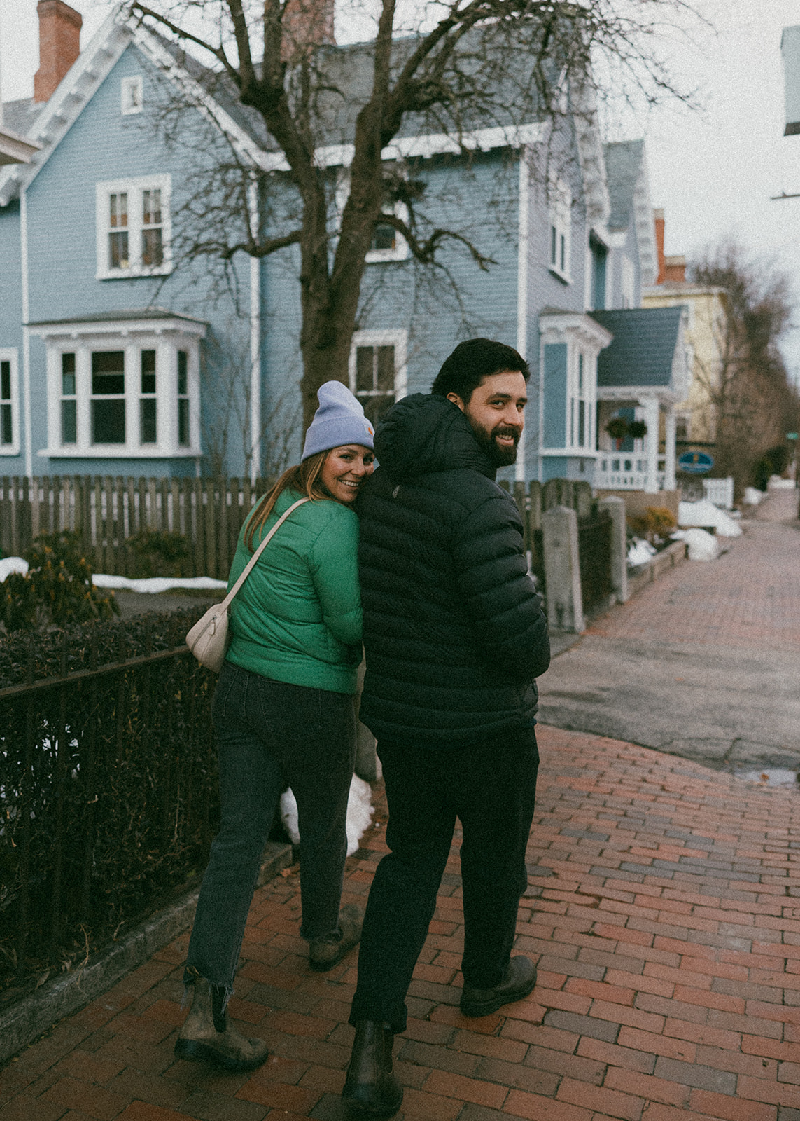 beautiful couple walk the streets of Portsmouth together