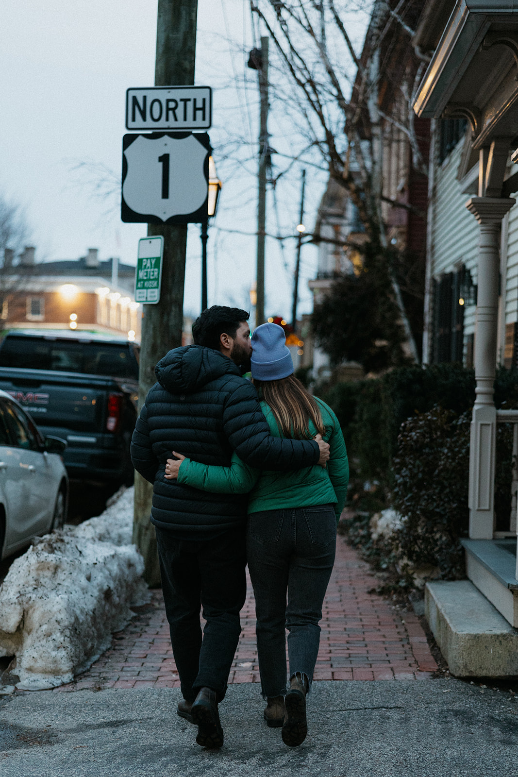 beautiful couple walk the streets of Portsmouth together