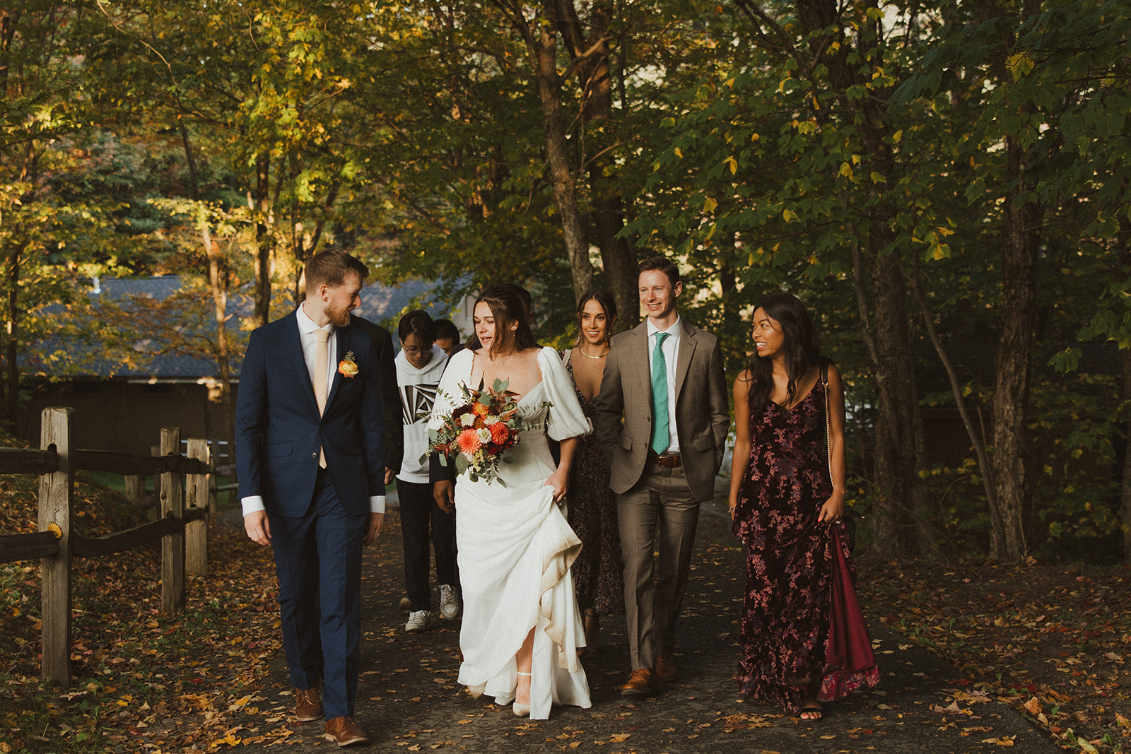 family walks with the bride and groom after their stunning Echo lake elopement ceremony