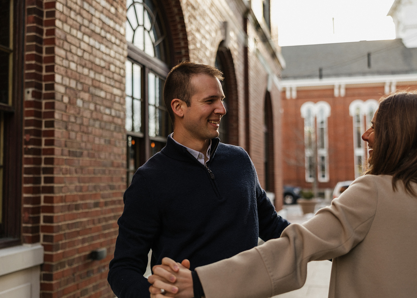 beautiful couple pose in a New Hampshire town