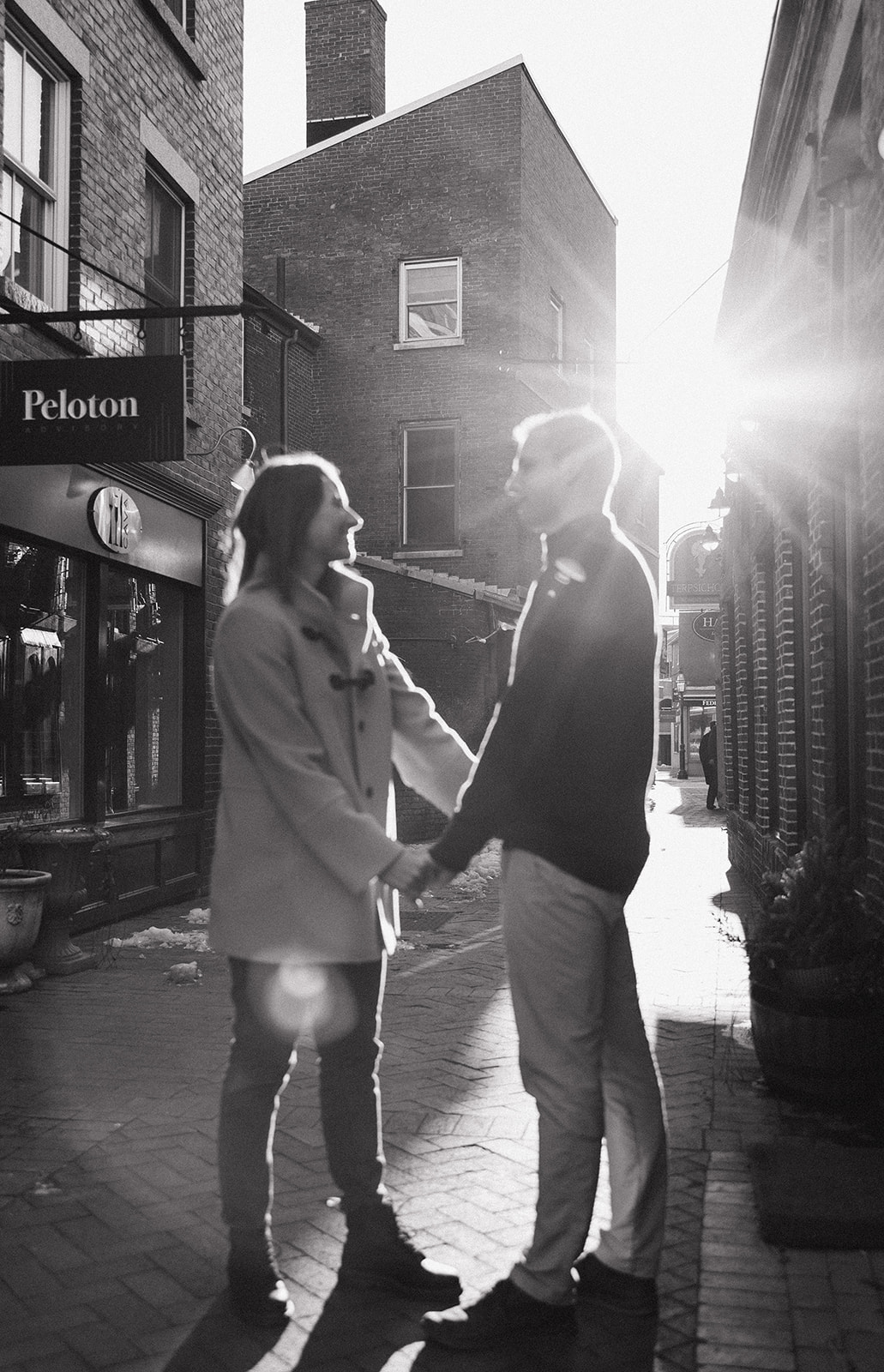 beautiful couple pose in a New Hampshire town