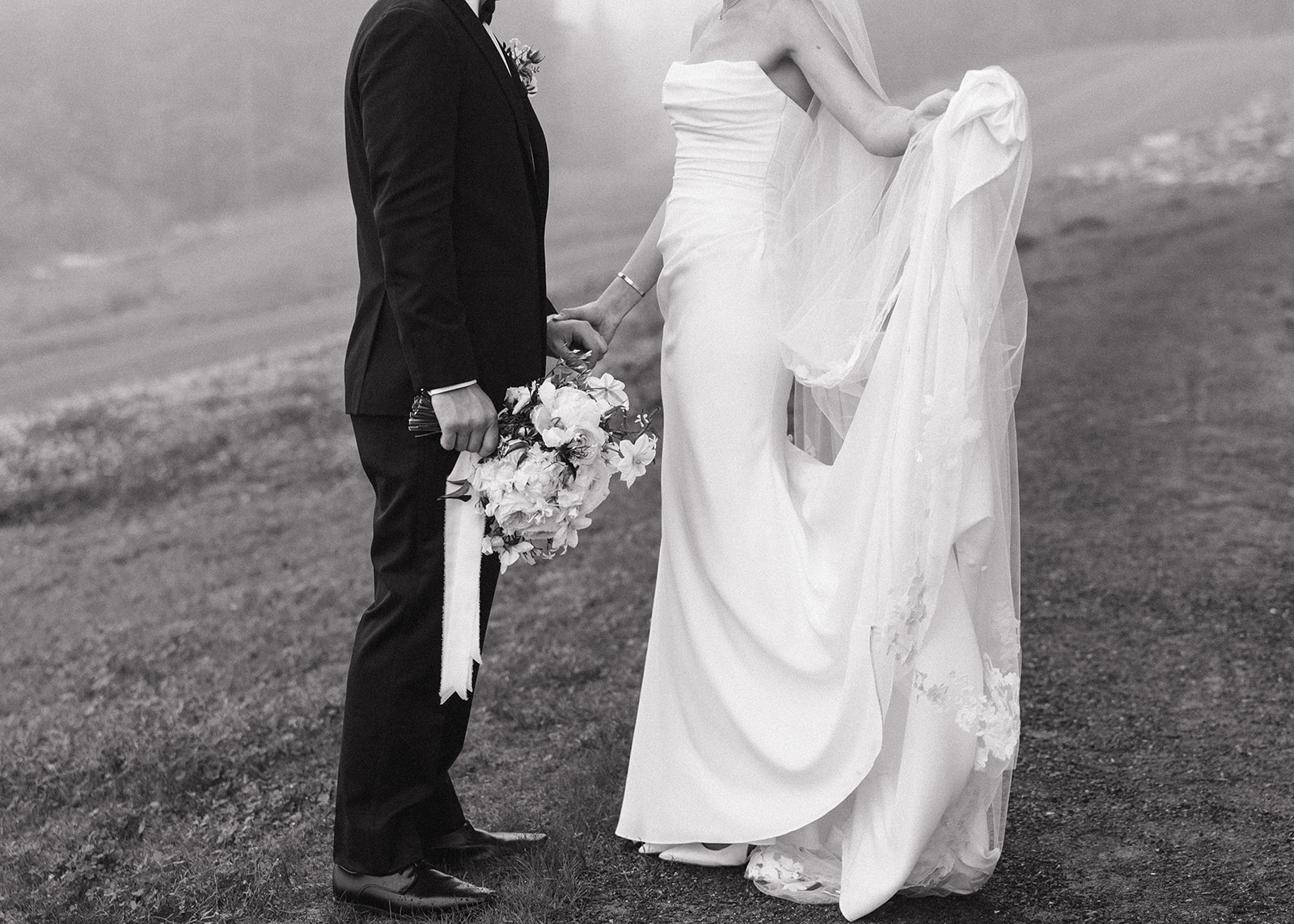 beautiful bride and groom pose together after their New Hampshire wedding day