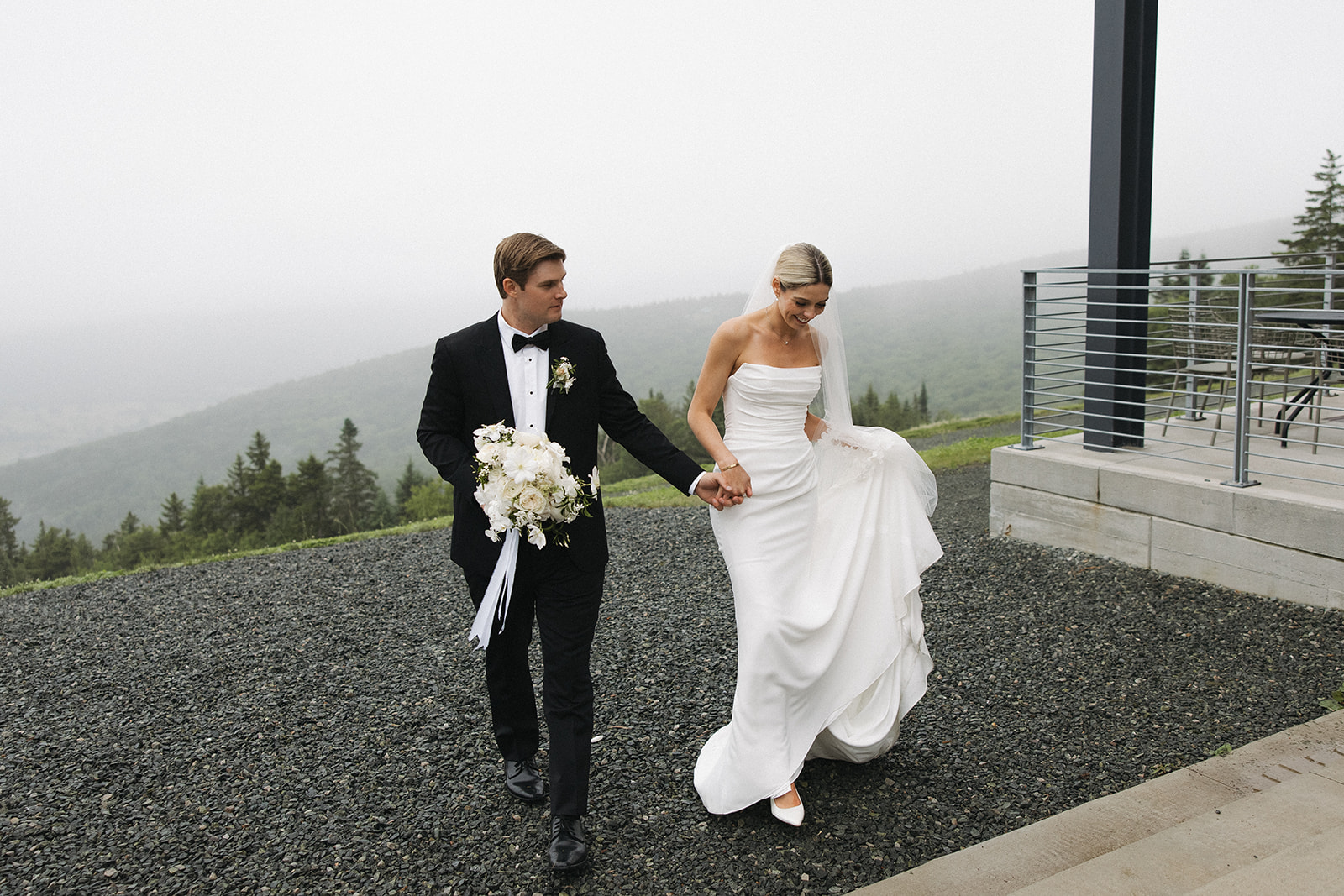 beautiful bride and groom take natural photos together 