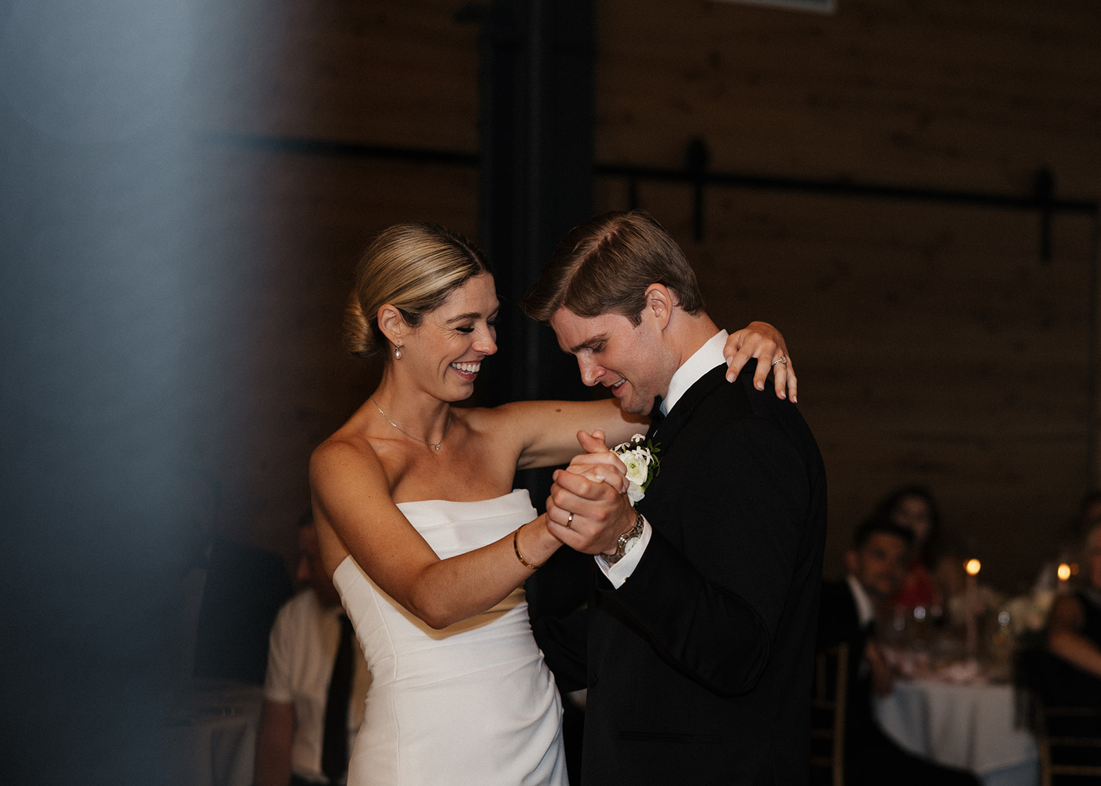 beautiful bride and groom take a candid photo together 