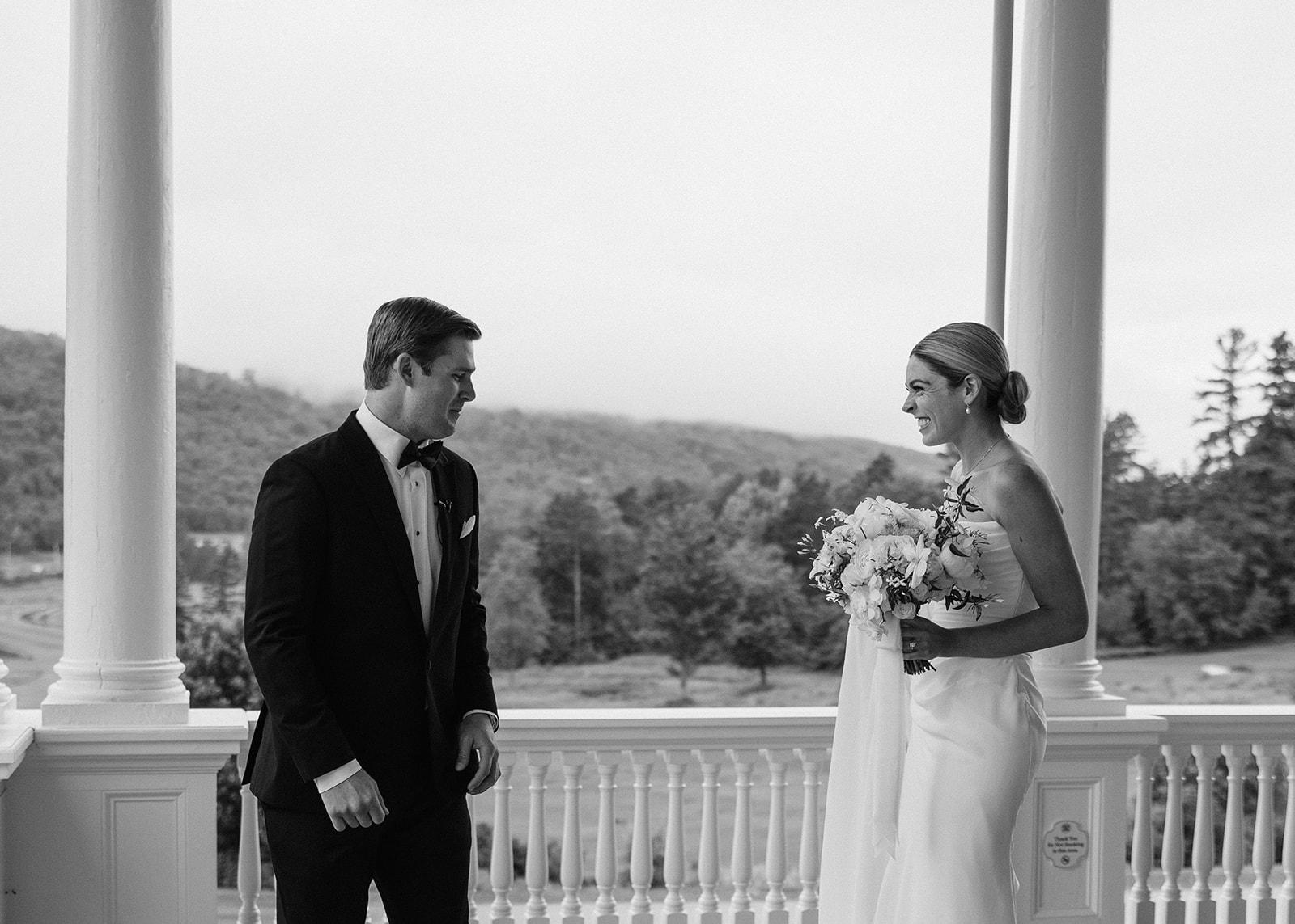 beautiful bride and groom take a candid photo together 