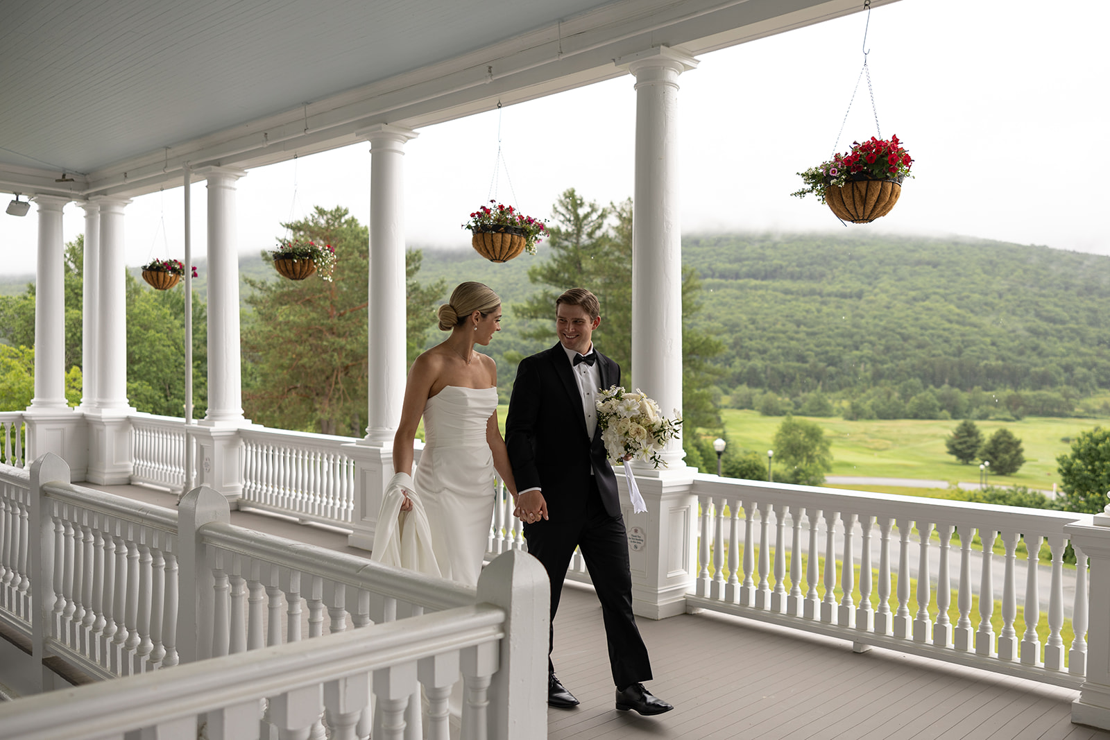 beautiful bride and groom take a candid photo together 