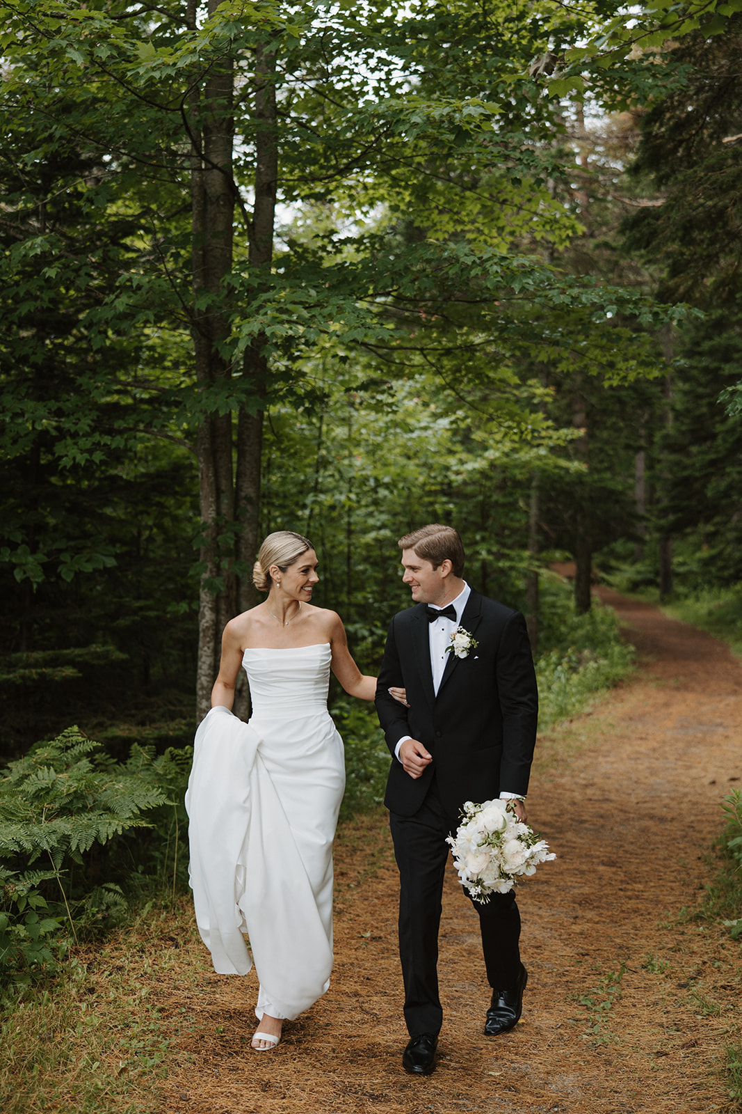 beautiful bride and groom pose together after their New Hampshire wedding day