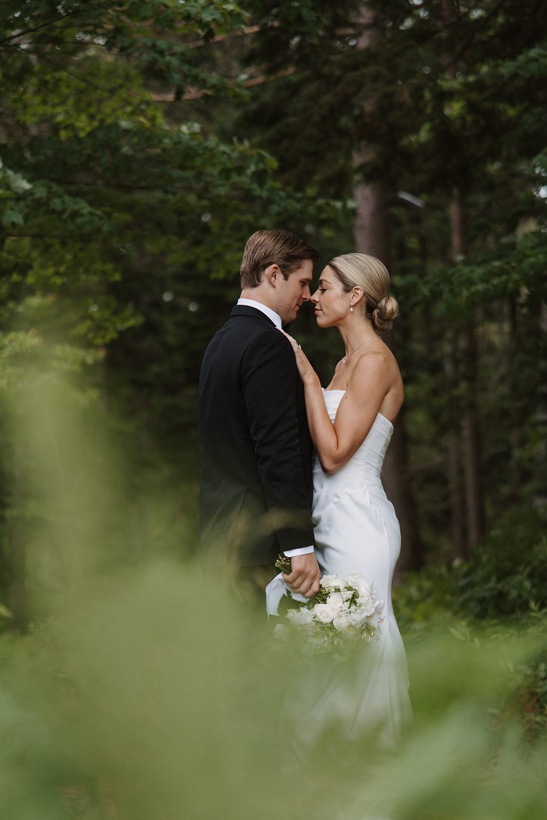 beautiful bride and groom pose together after their New Hampshire wedding day