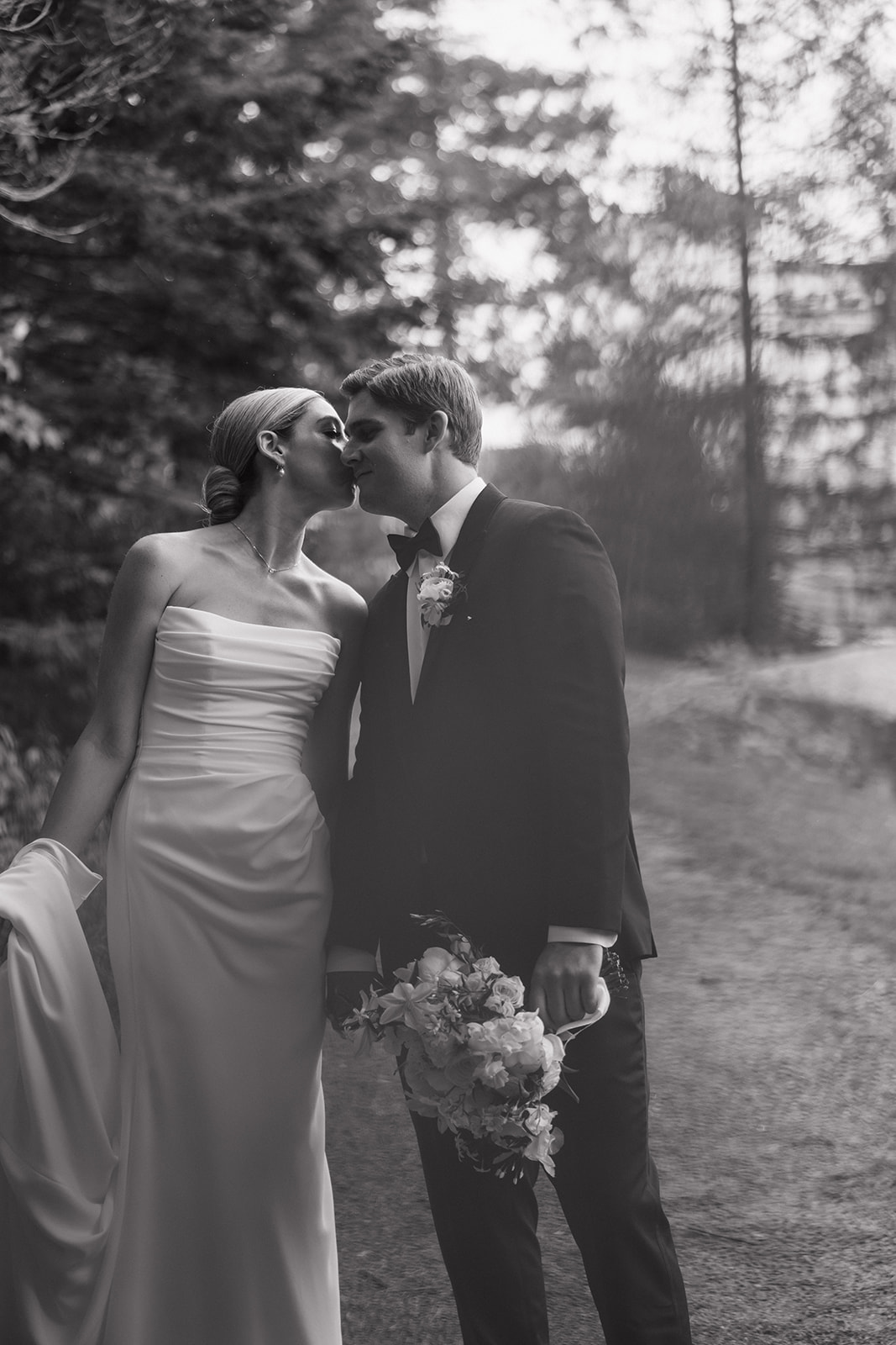 beautiful bride and groom pose together after their New Hampshire wedding day