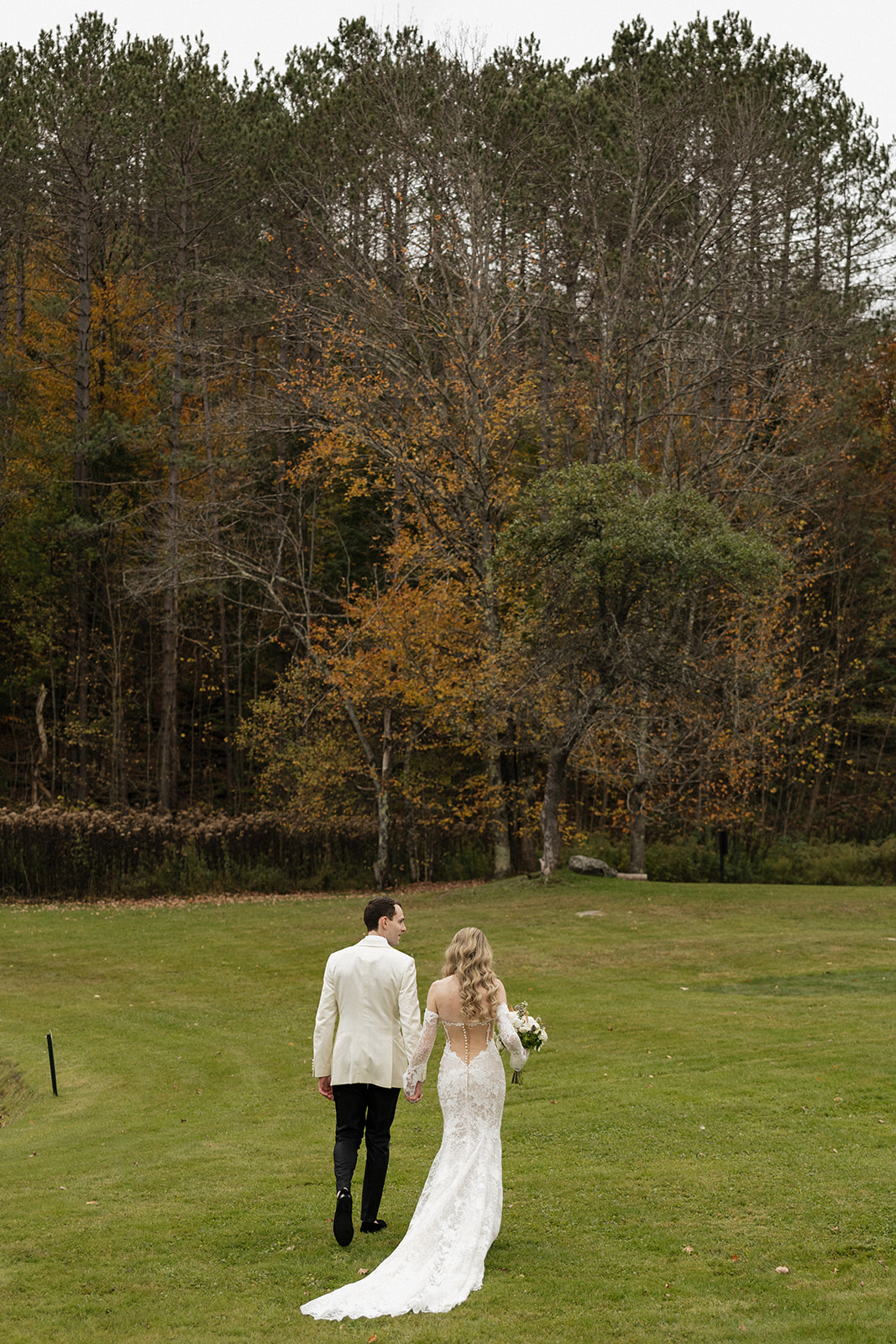 bride and groom pose together before their dreamy Vermont wedding day