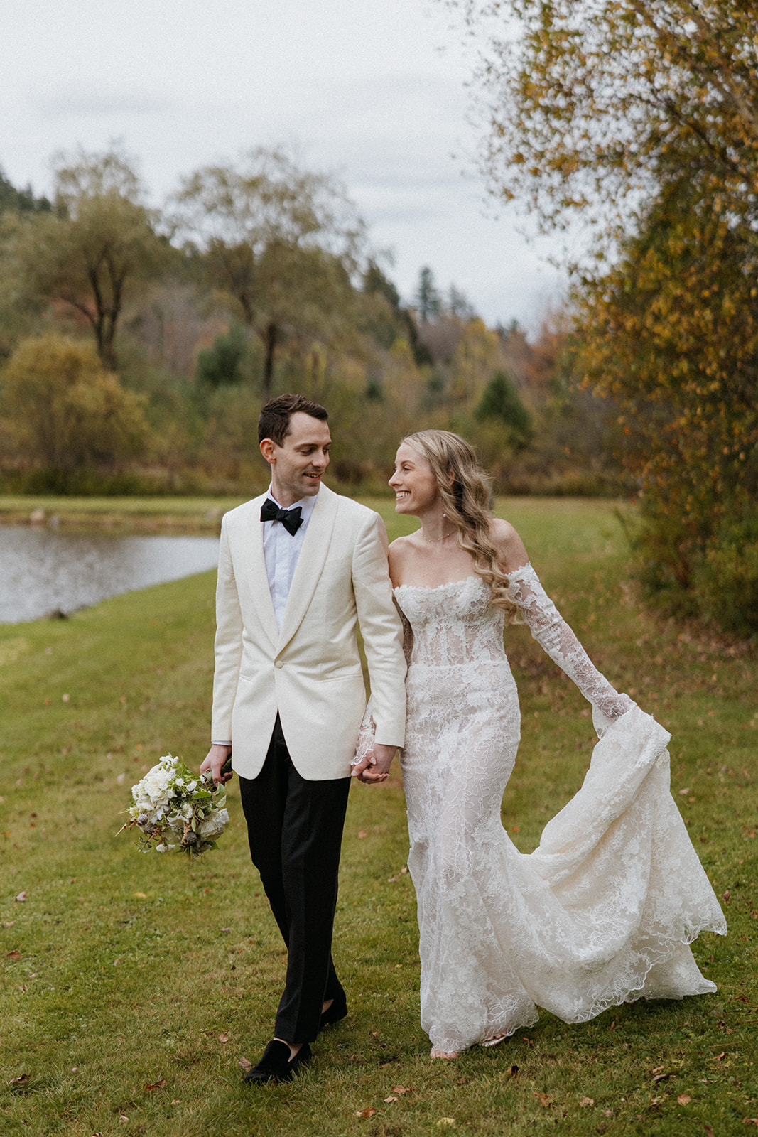 bride and groom pose together before their dreamy Vermont wedding day