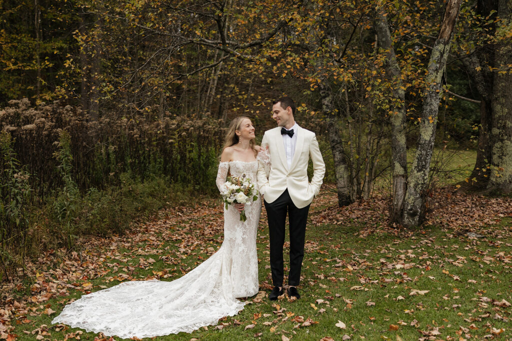 bride and groom pose together before their dreamy Vermont wedding day