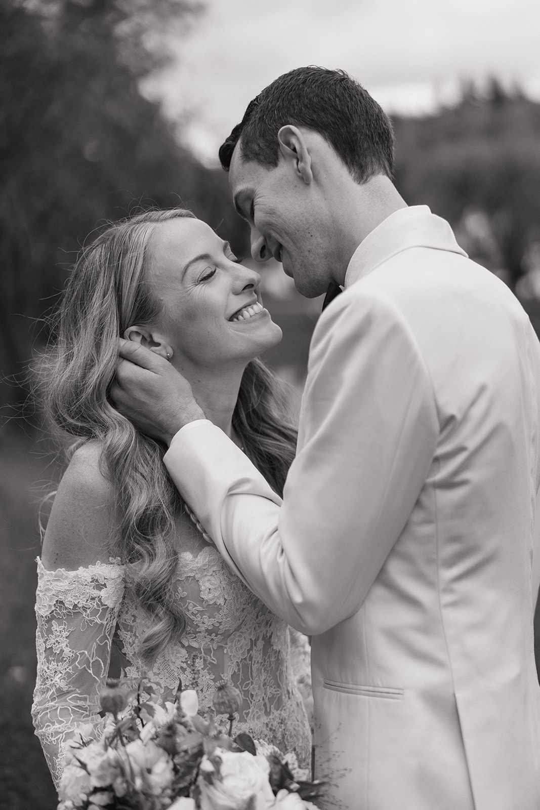 bride and groom pose together before their dreamy Vermont wedding day