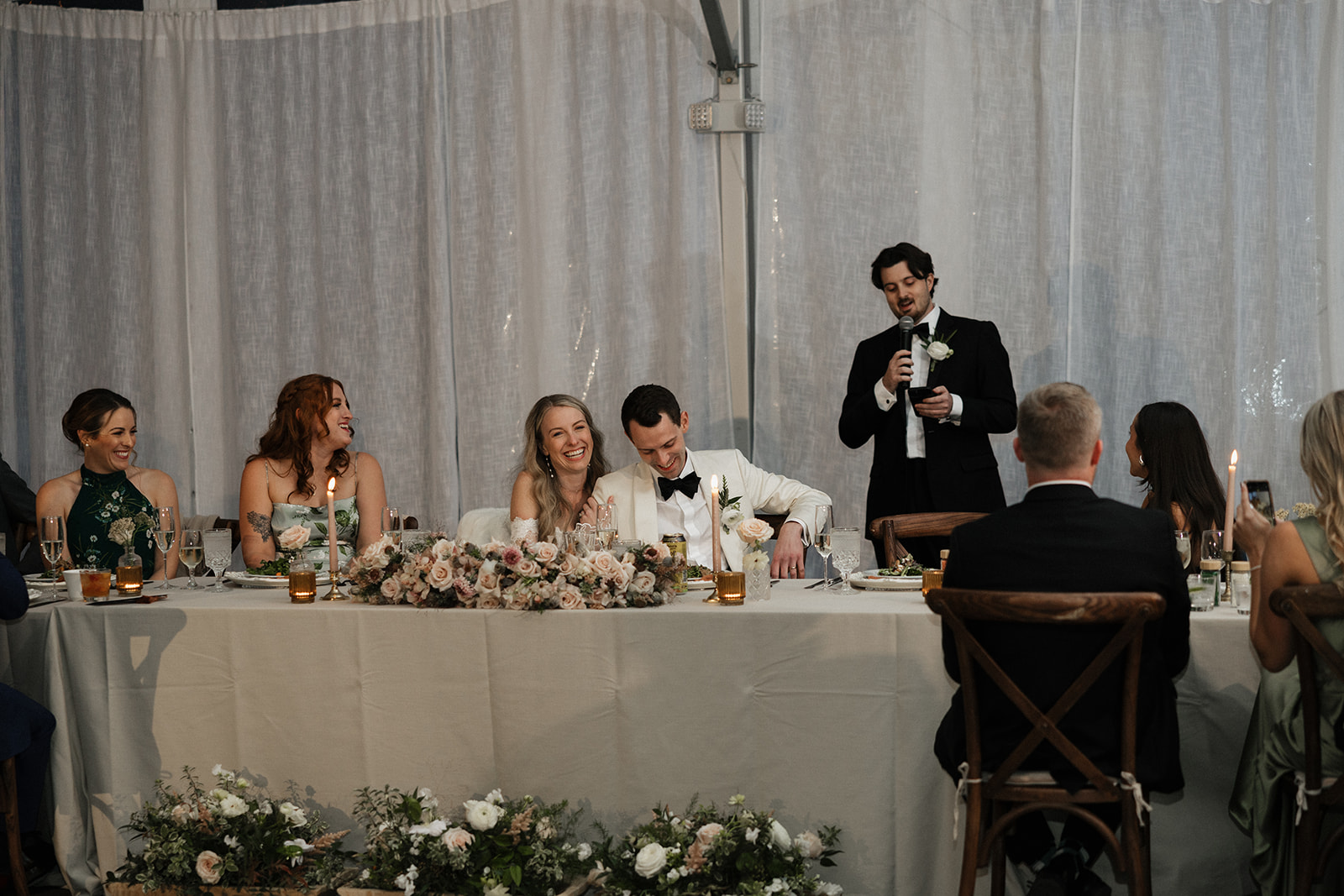 bride and groom celebrate at their wedding reception