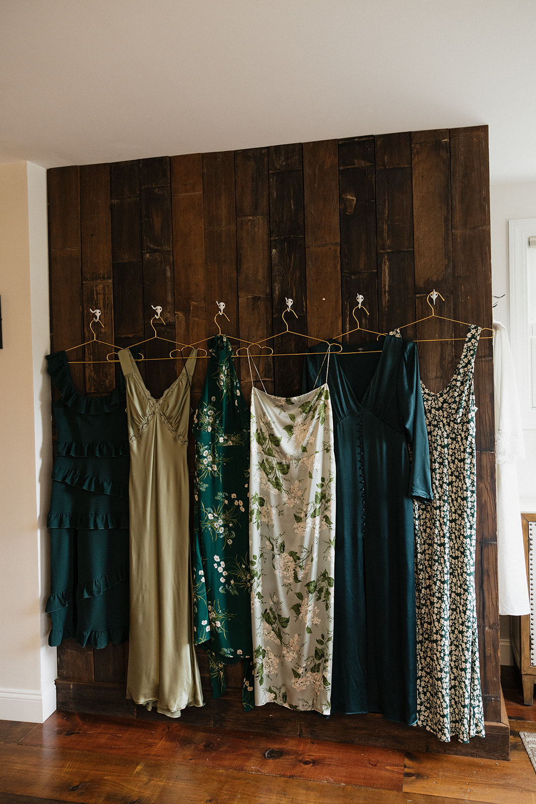 bridesmaids dresses hang up before the stunning Vermont wedding day