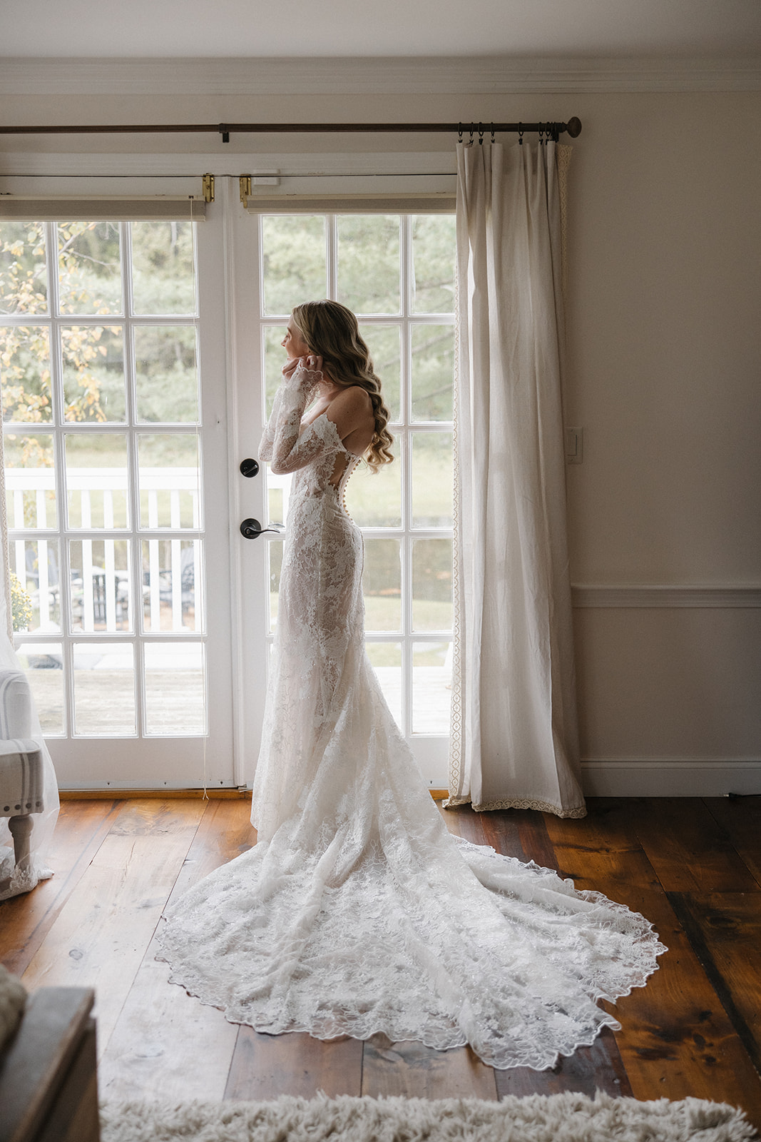 beautiful bride poses for a photo during her Vermont wedding day