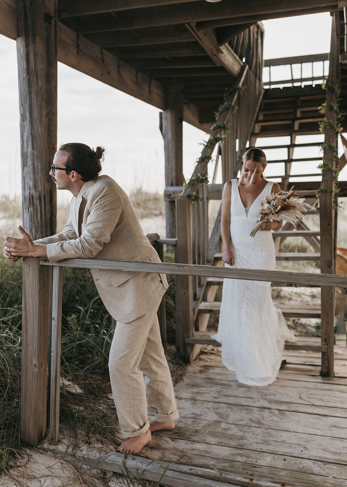 beautiful bride and groom pose together