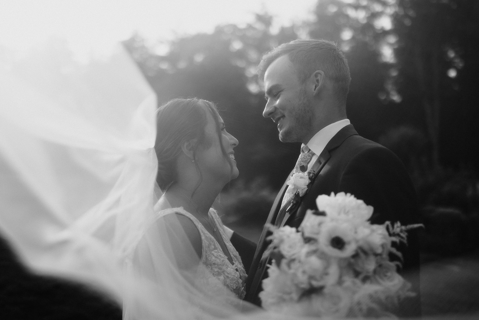 beautiful bride and groom pose together