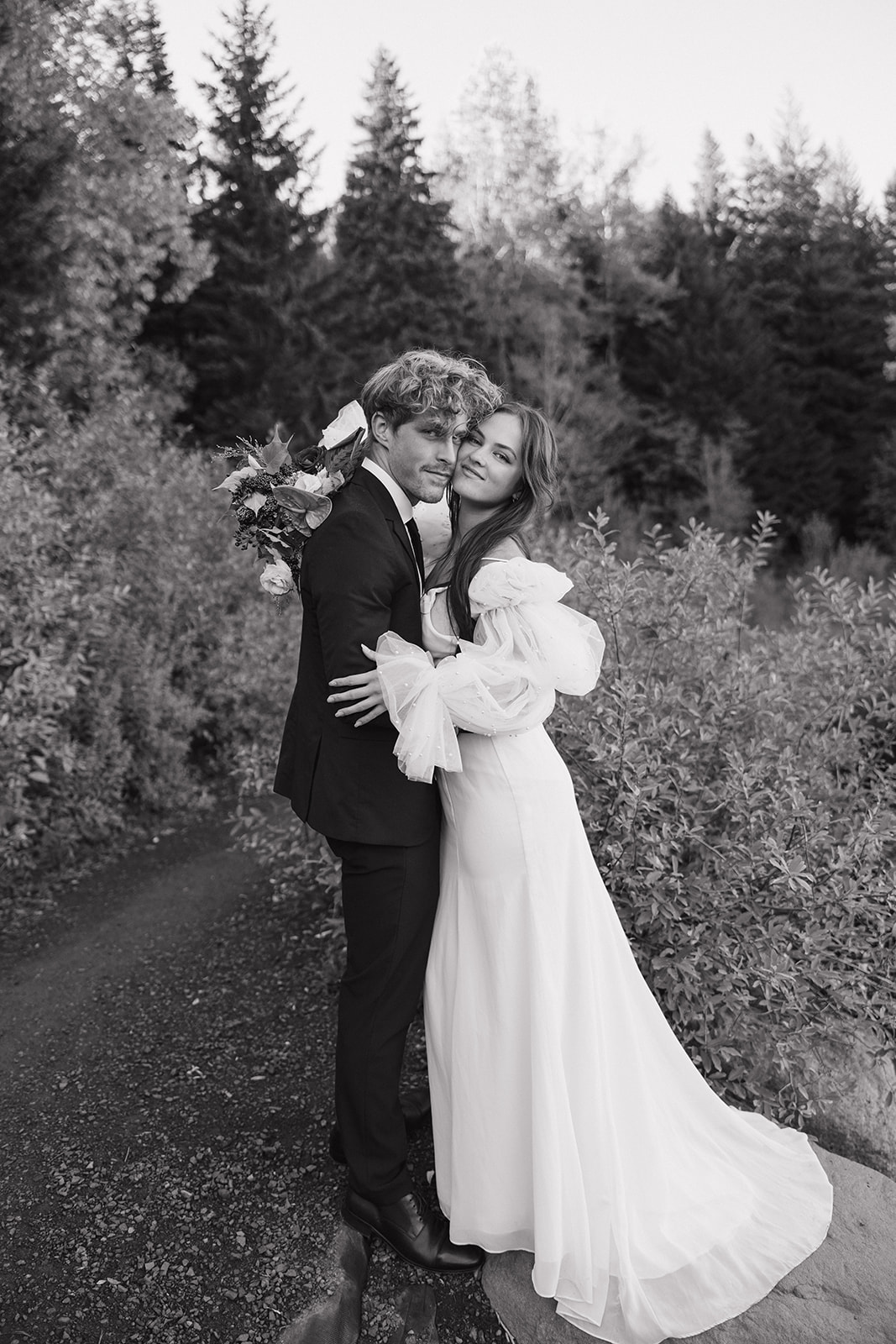 beautiful bride and groom pose together