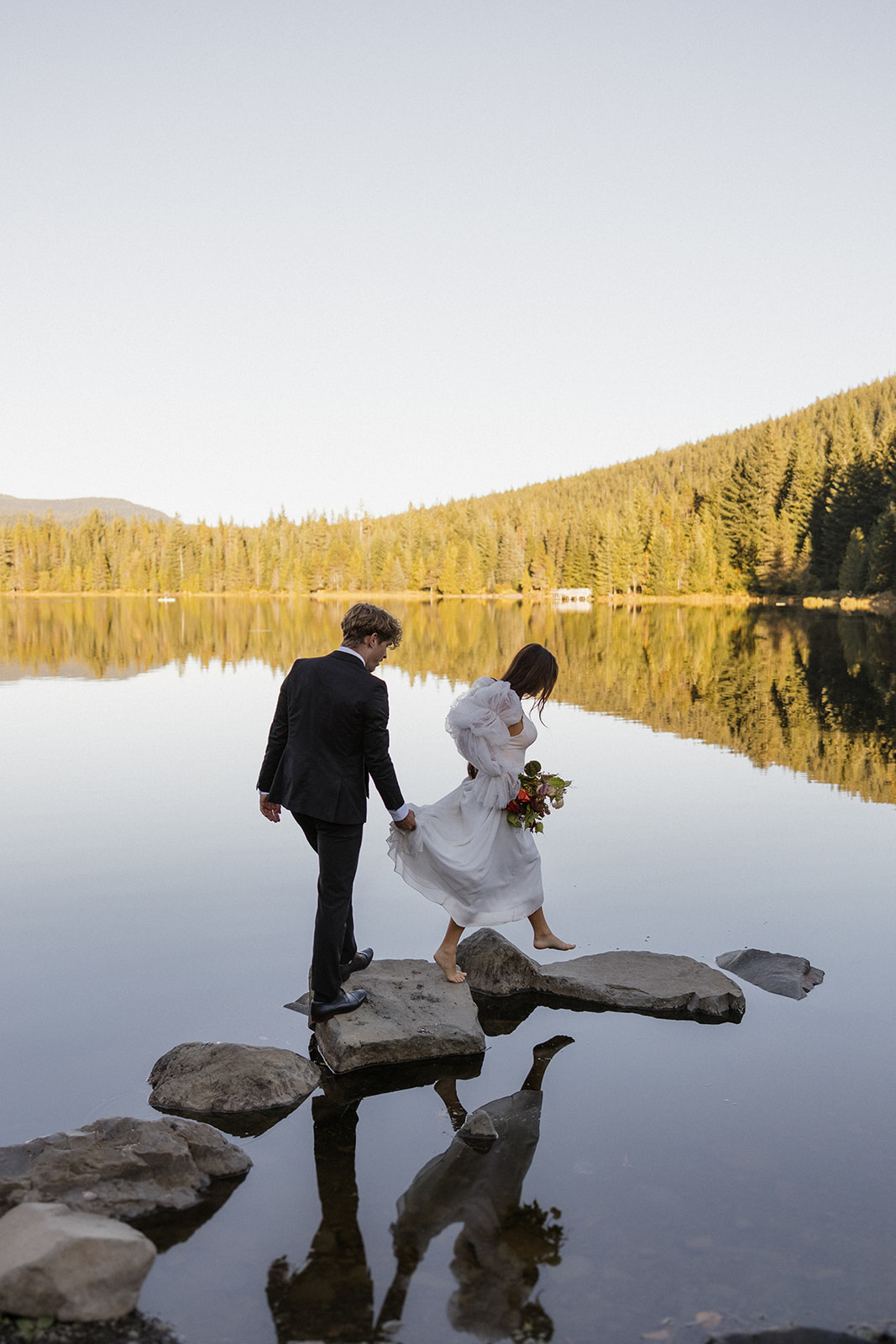 beautiful bride and groom pose together