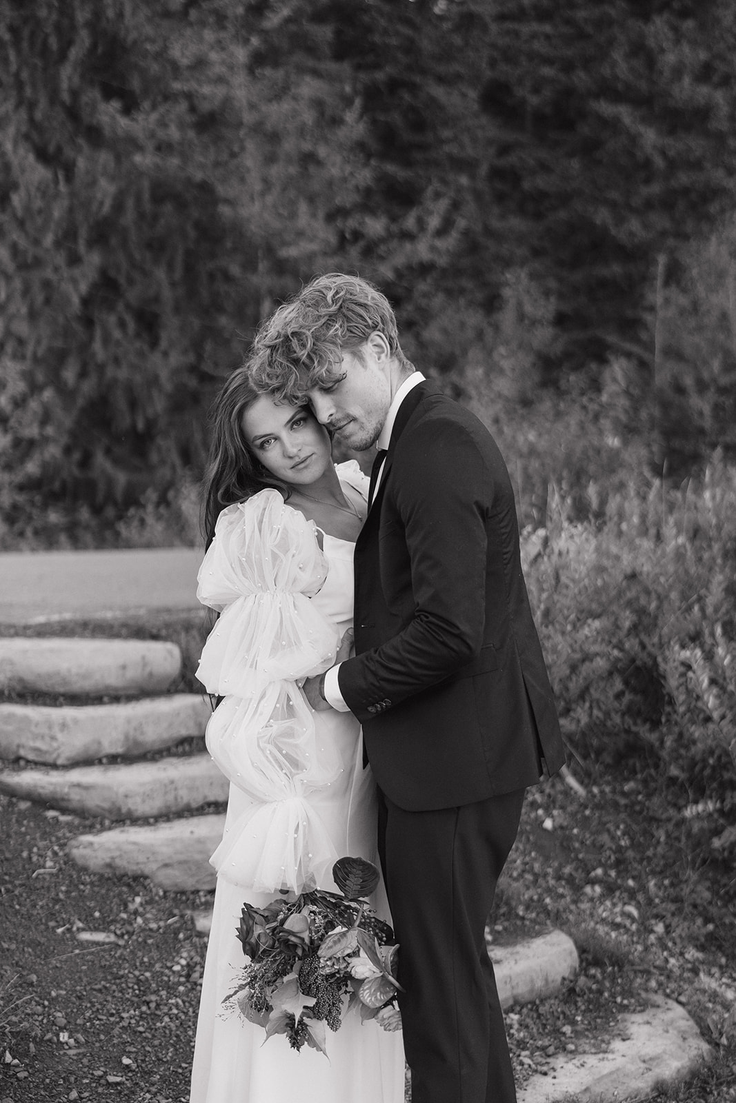 beautiful bride and groom pose together