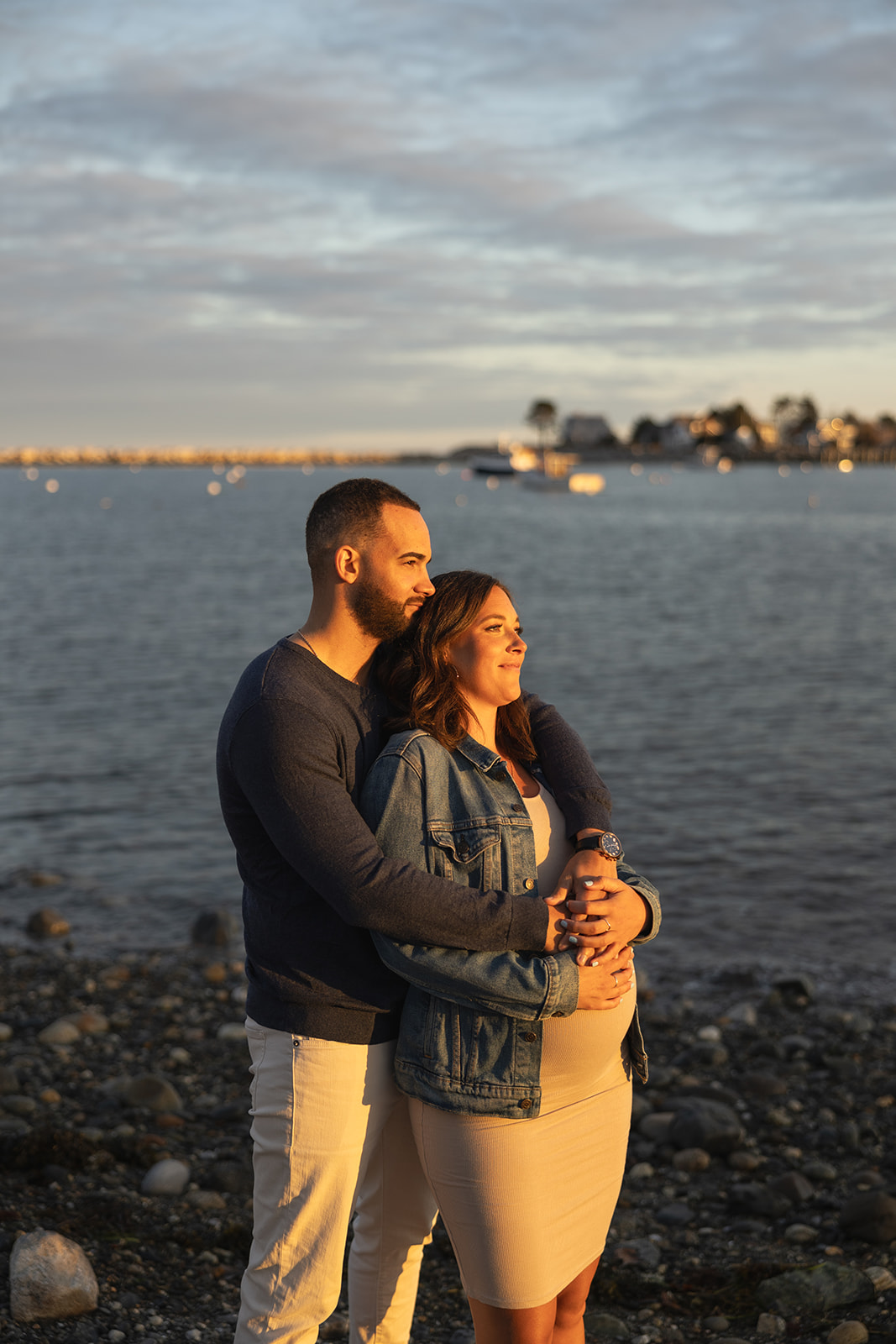 beautiful couple pose together on the beach