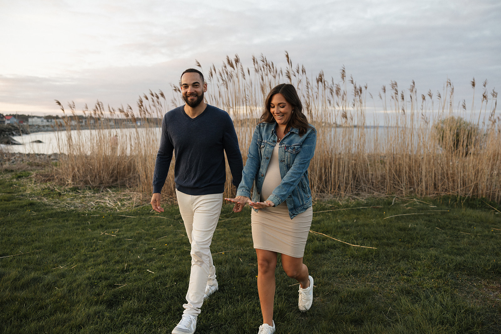 beautiful couple pose together on the beach