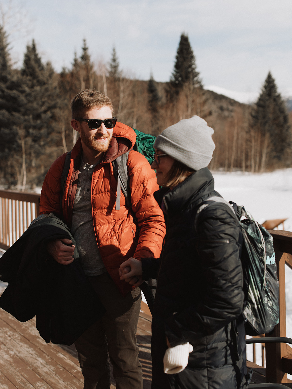 bride and groom hike together to their NH elopement site