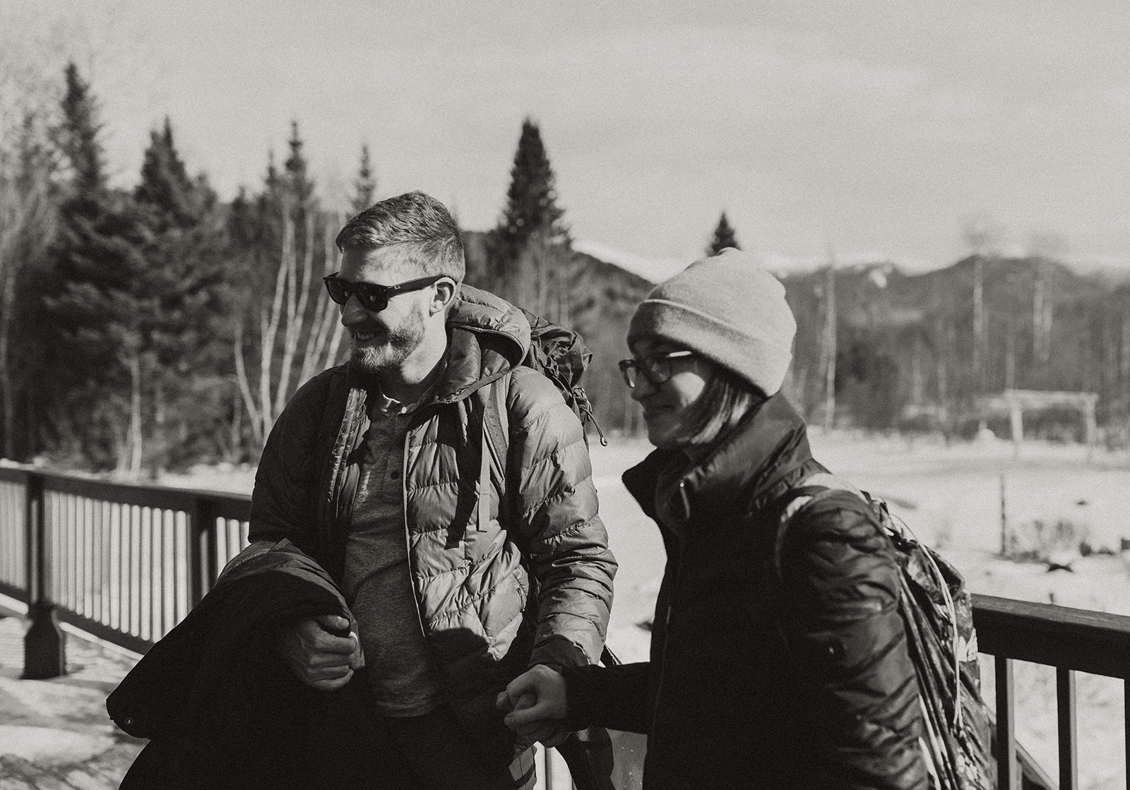 bride and groom hike together to their NH elopement site