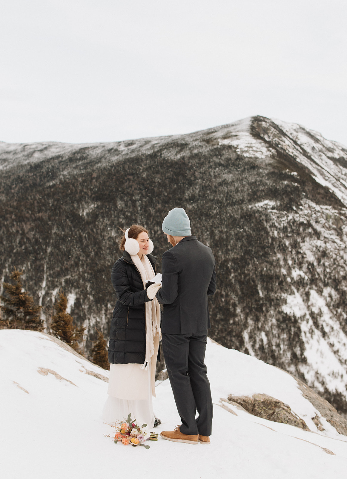 stunning couple pose together during their New Hampshire elopement at Mt. Willard