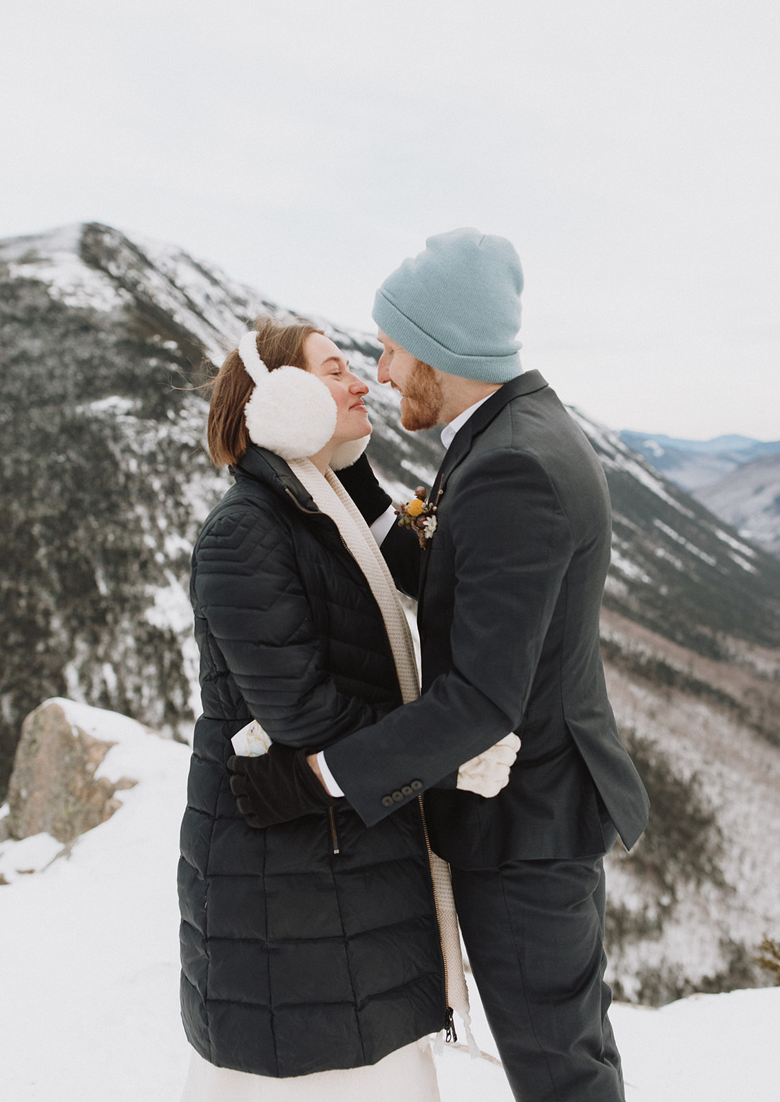 stunning couple pose together during their New Hampshire elopement at Mt. Willard