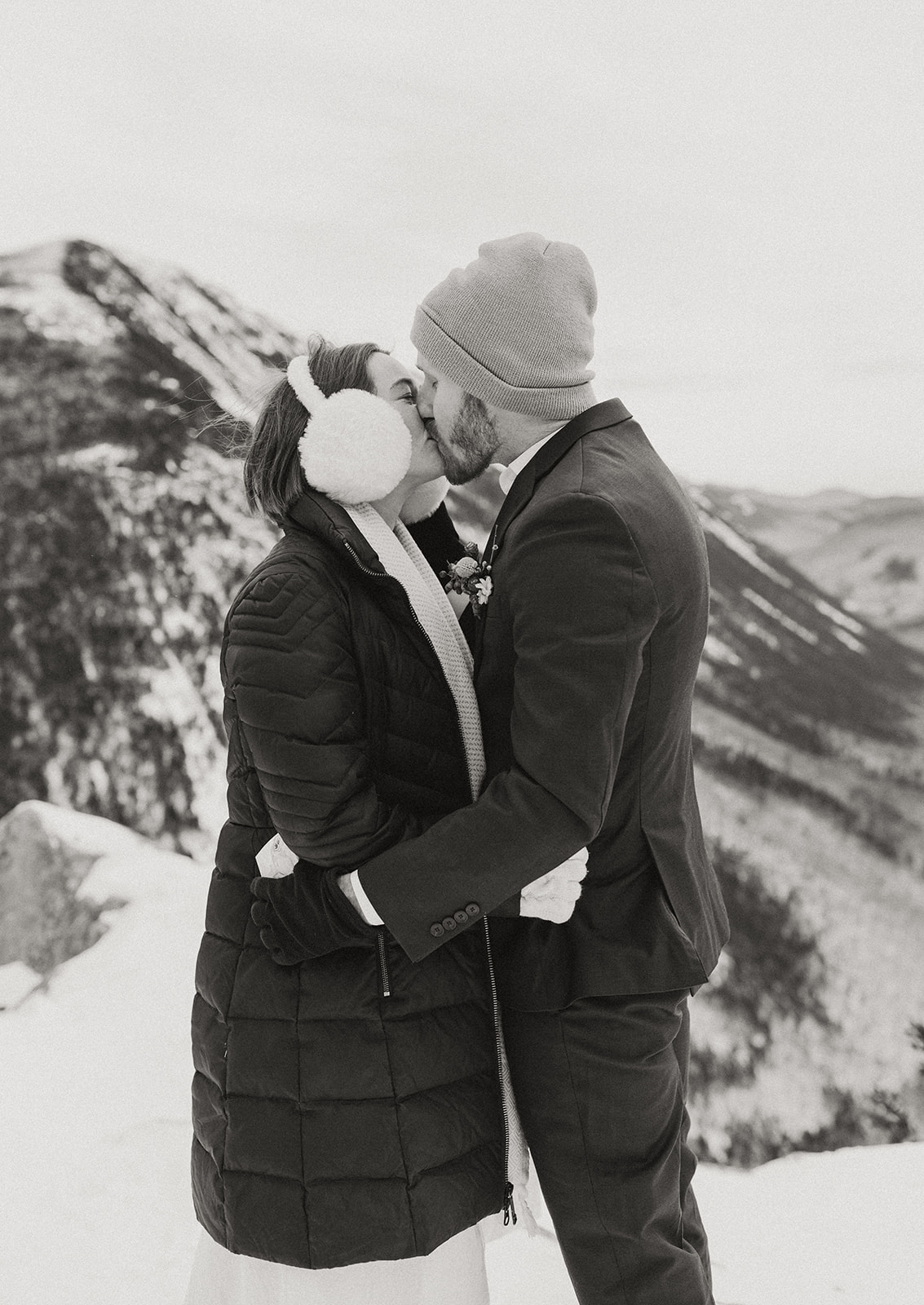 stunning couple pose together during their New Hampshire elopement at Mt. Willard