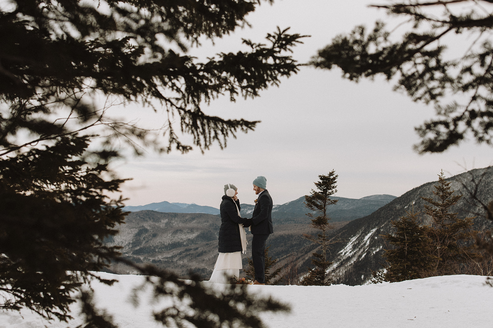 stunning couple pose together during their New Hampshire elopement at Mt. Willard