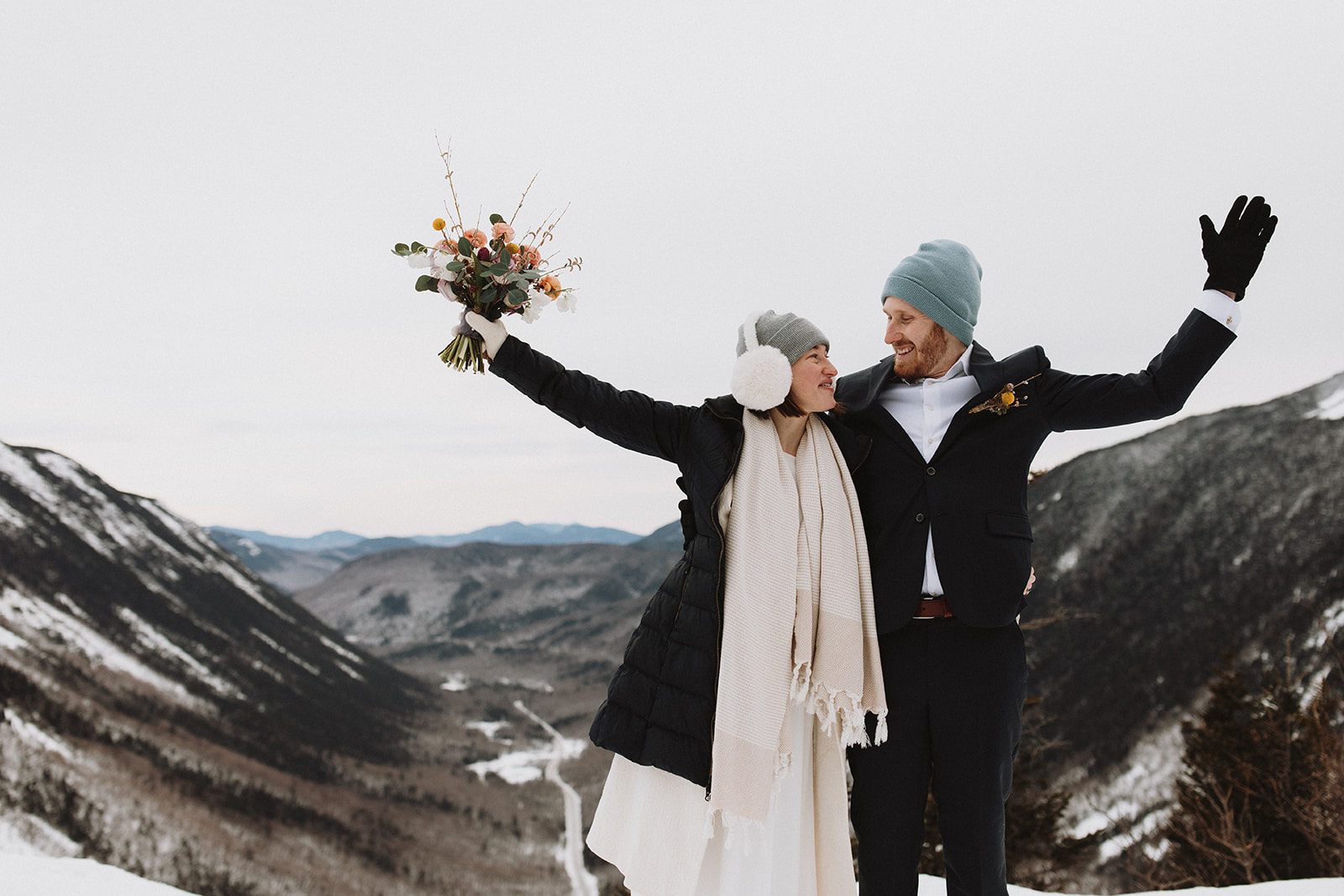 stunning couple pose together during their New Hampshire elopement at Mt. Willard