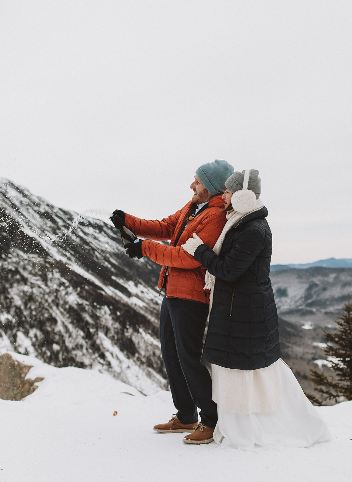 stunning couple pose together during their New Hampshire elopement at Mt. Willard