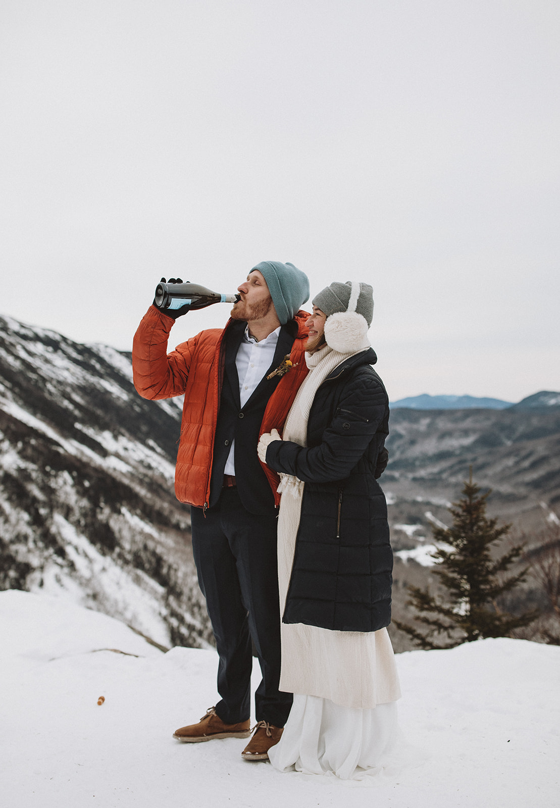 stunning couple pose together during their New Hampshire elopement at Mt. Willard