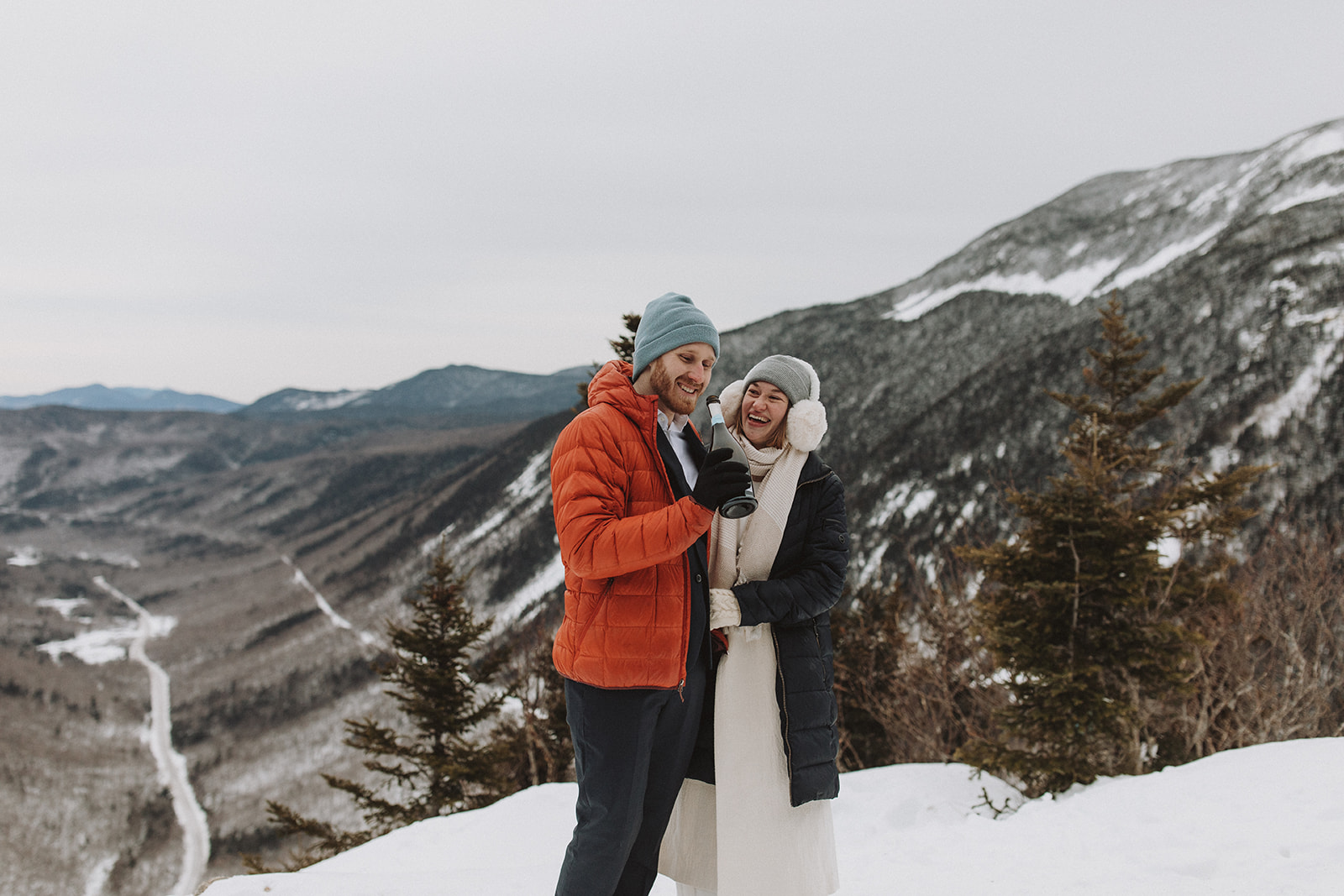 stunning couple pose together during their New Hampshire elopement at Mt. Willard