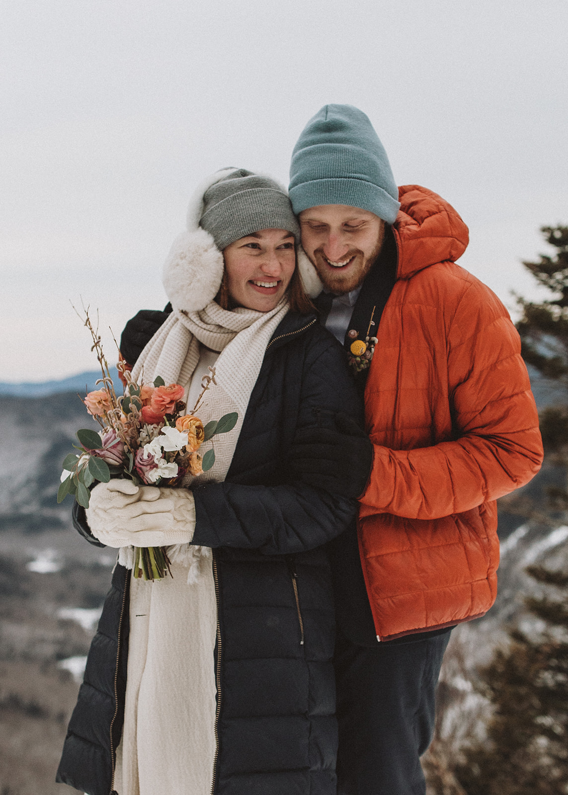 stunning couple pose together during their New Hampshire elopement at Mt. Willard