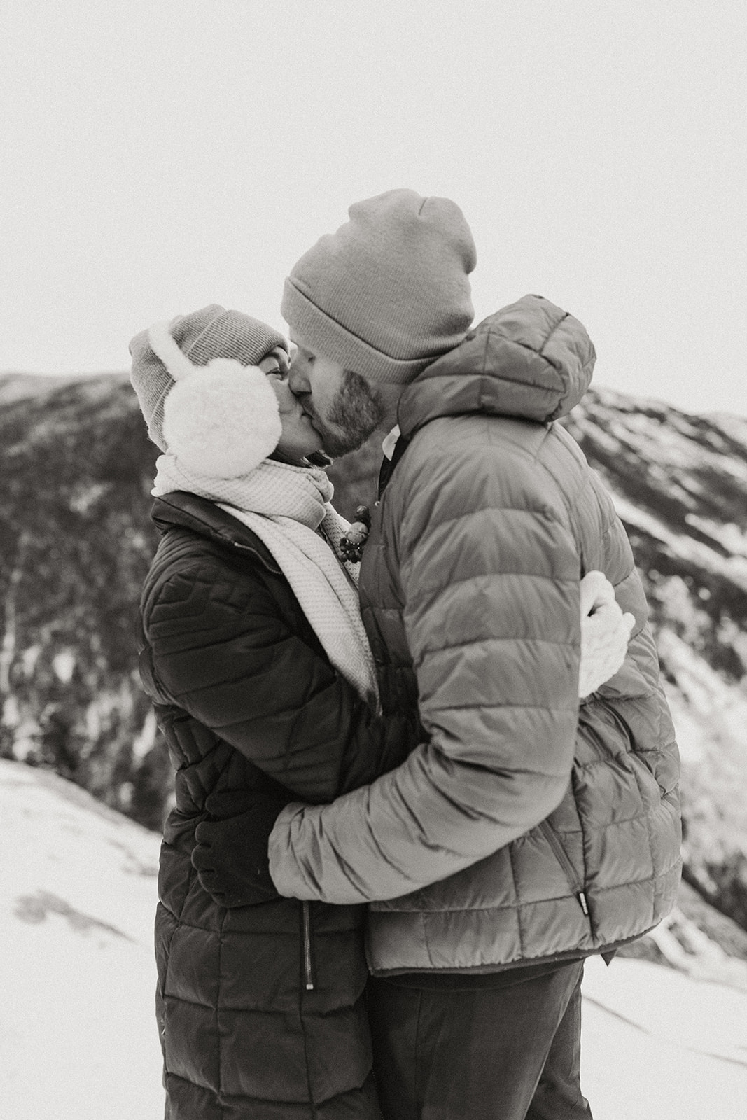 stunning couple pose together during their New Hampshire elopement at Mt. Willard