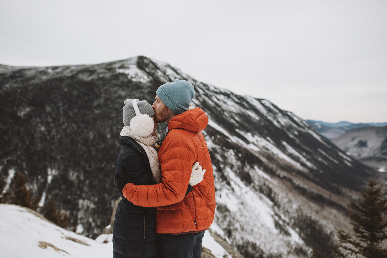 stunning couple pose together during their New Hampshire elopement at Mt. Willard