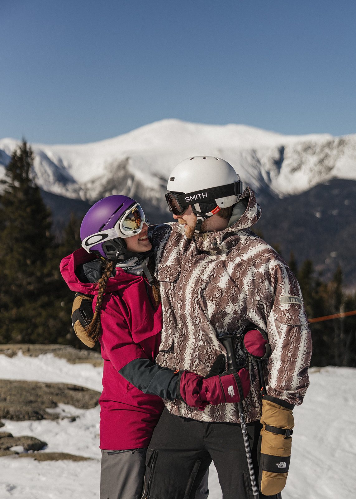 creative winter skiing engagement photos in the White Mountains