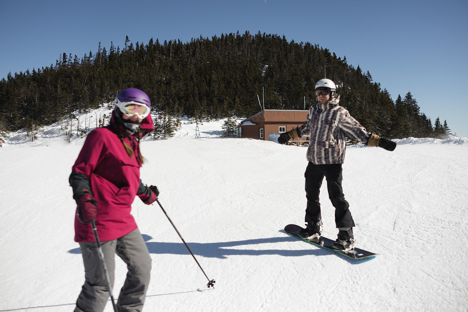 creative winter skiing engagement photos in the White Mountains